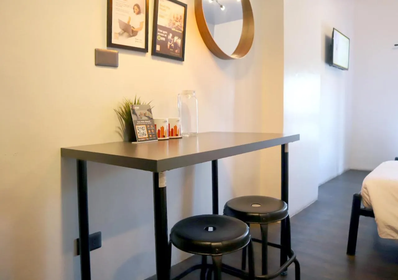 Decorative detail, Bed in mySTAY Hotel BGC North