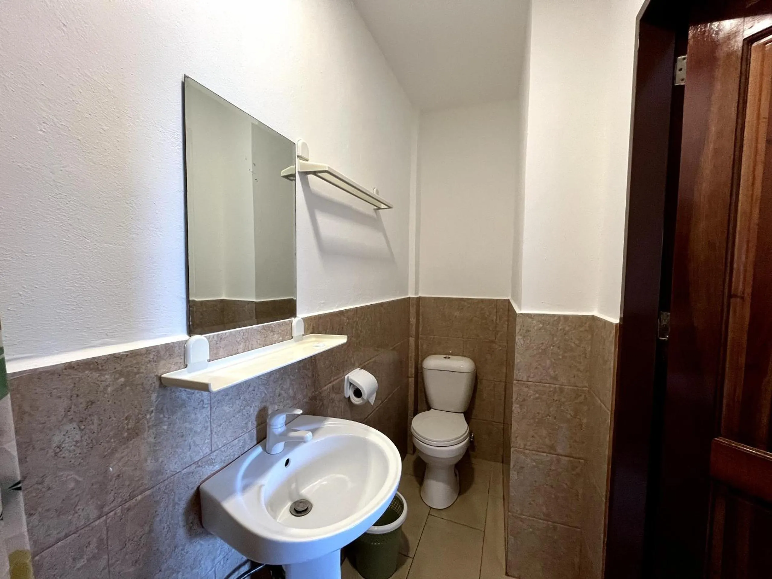 Toilet in Ocean Bay Beach Resort