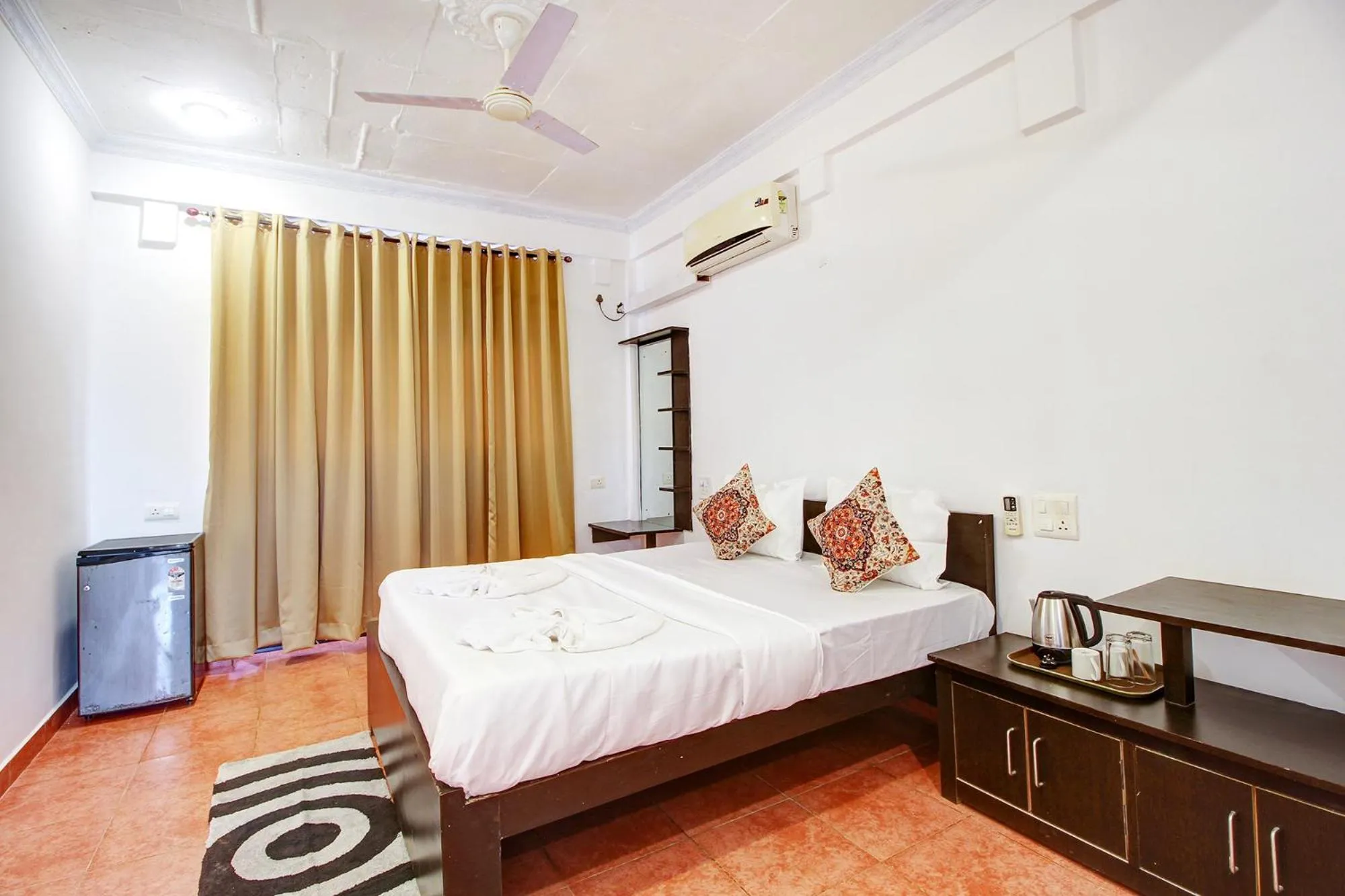 Bed in FabHotel Pleasure Inn