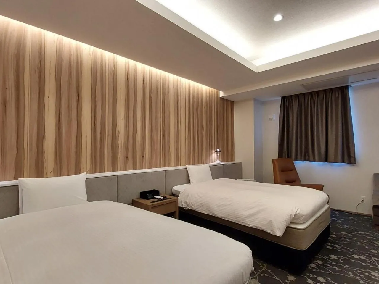 Bed in The Legato Inn MIFUNE