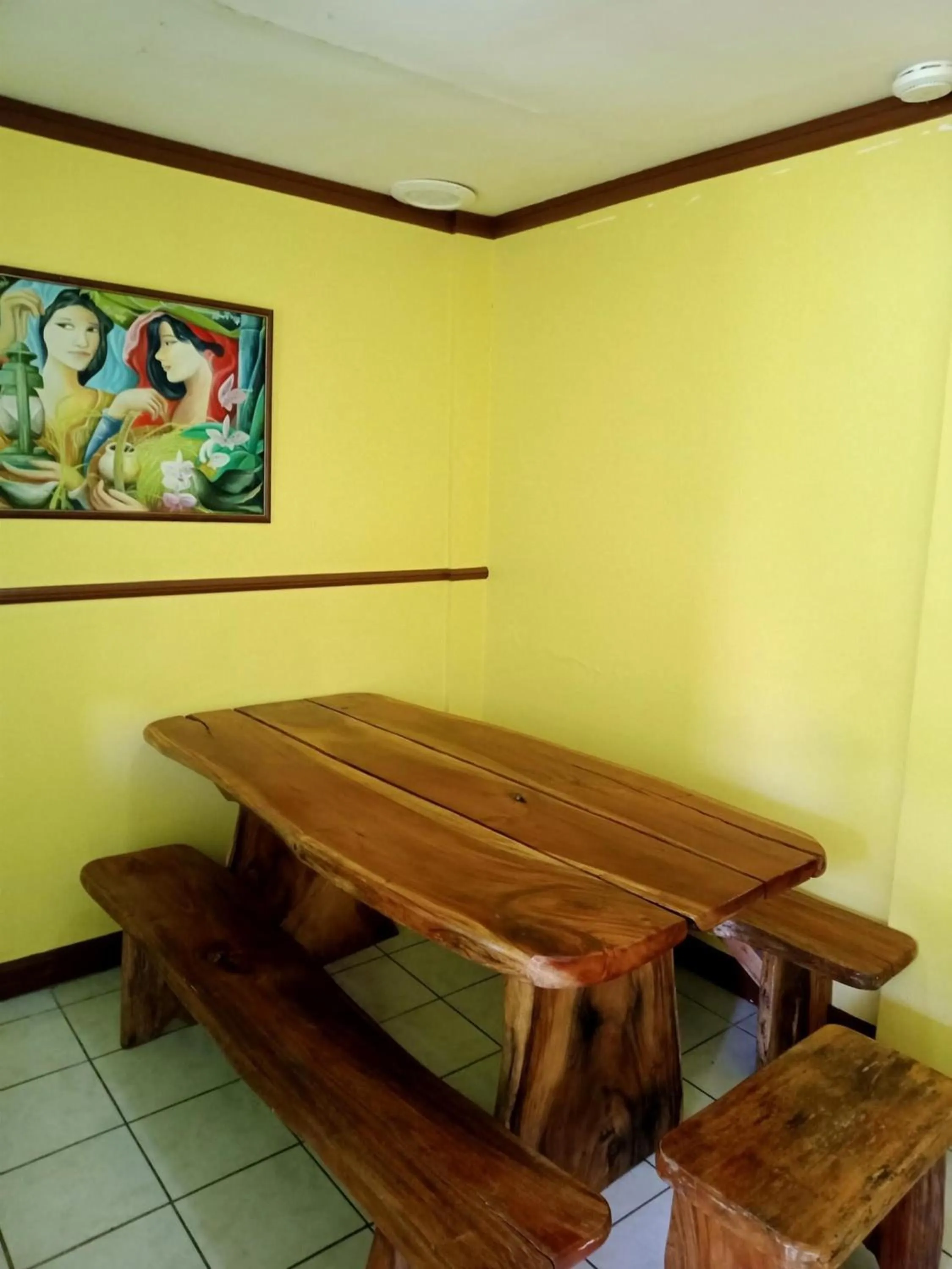 Seating area in La Vista Pansol Resort Complex by RedDoorz