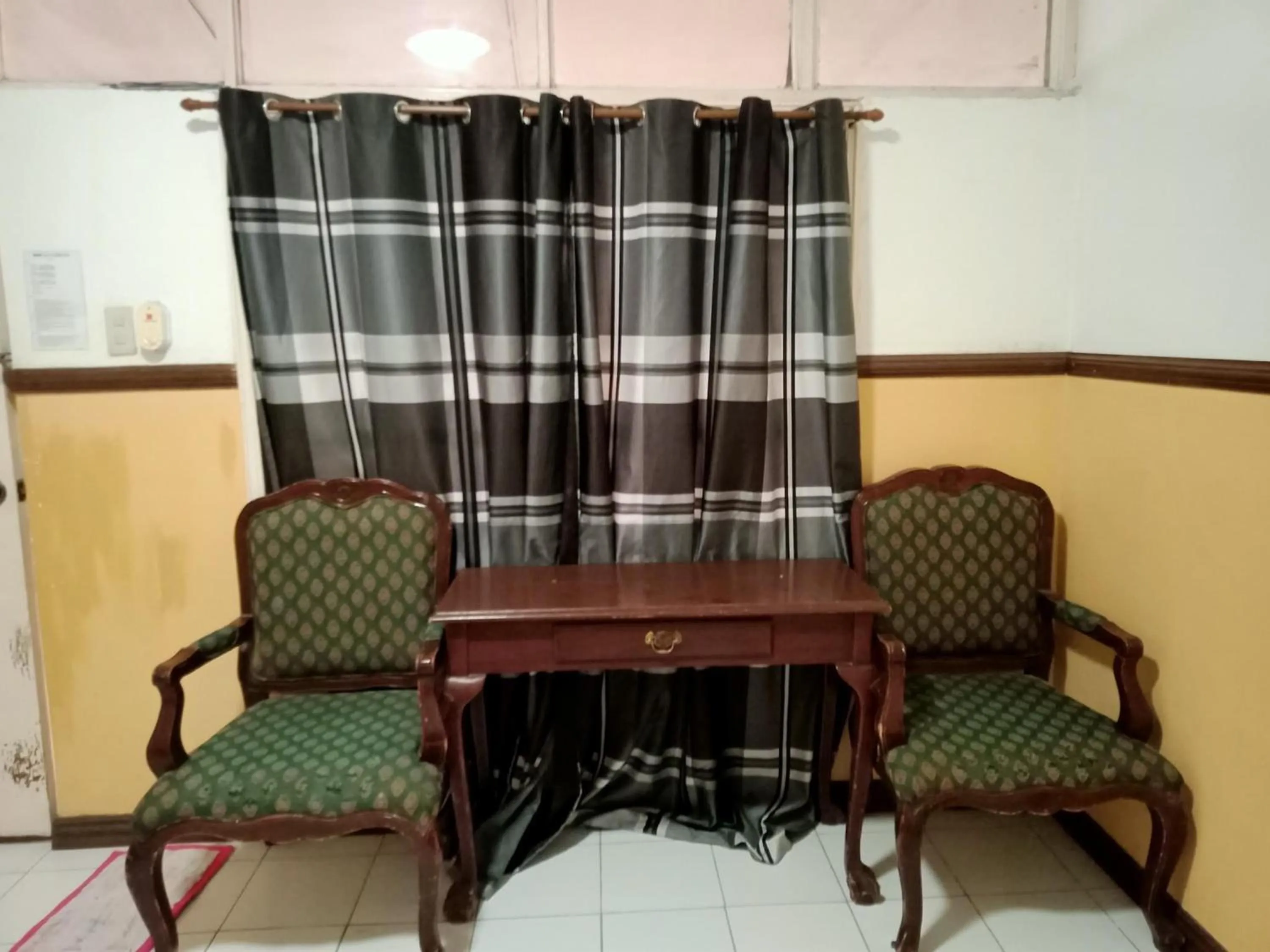 Living room in La Vista Pansol Resort Complex by RedDoorz