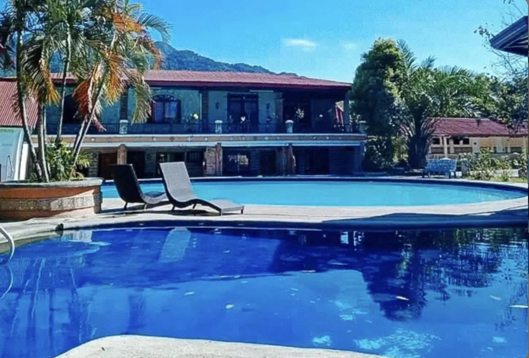 Swimming pool in La Vista Pansol Resort Complex by RedDoorz