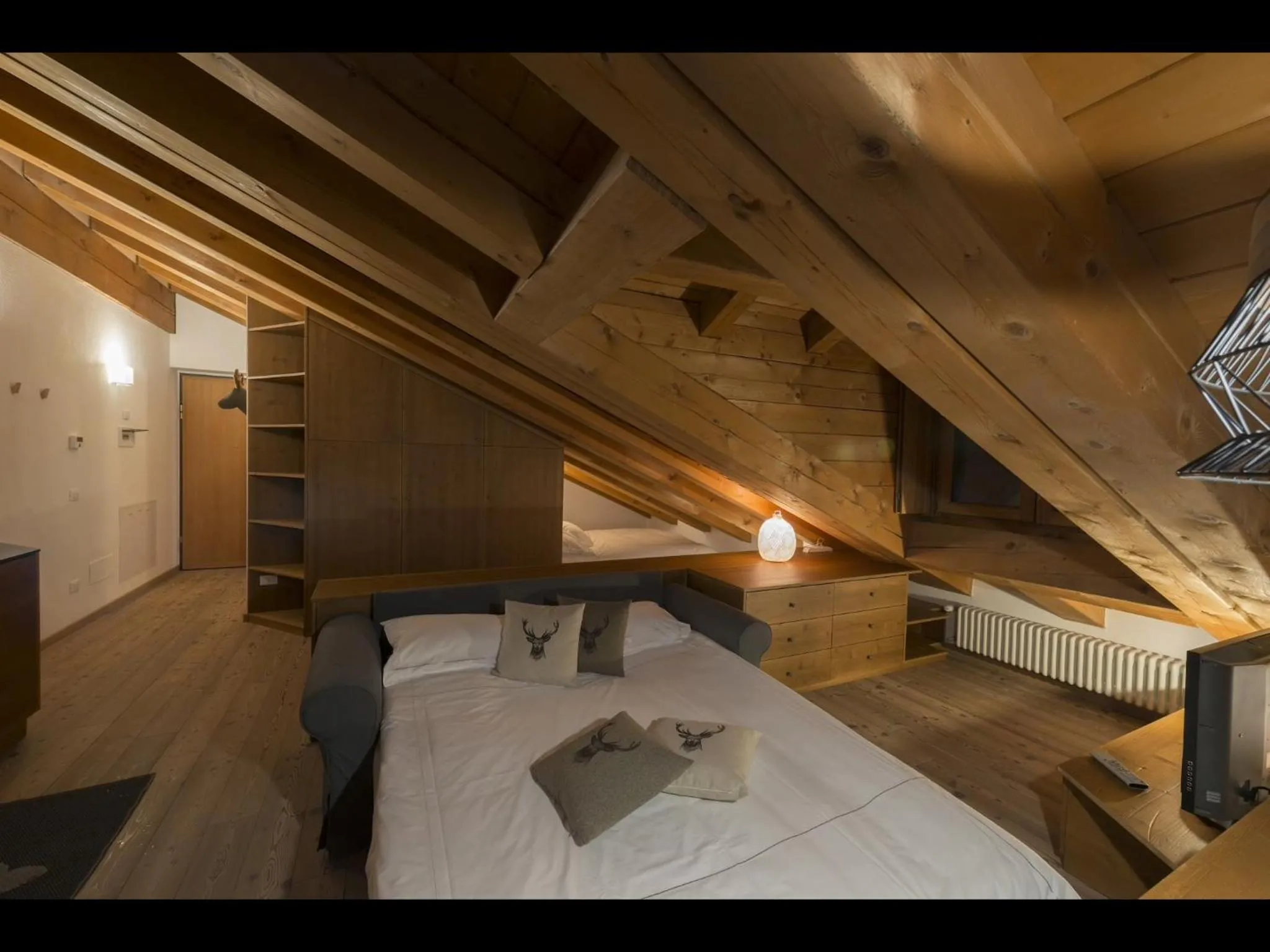 Bed in Appartamento Jardin des Alpes.