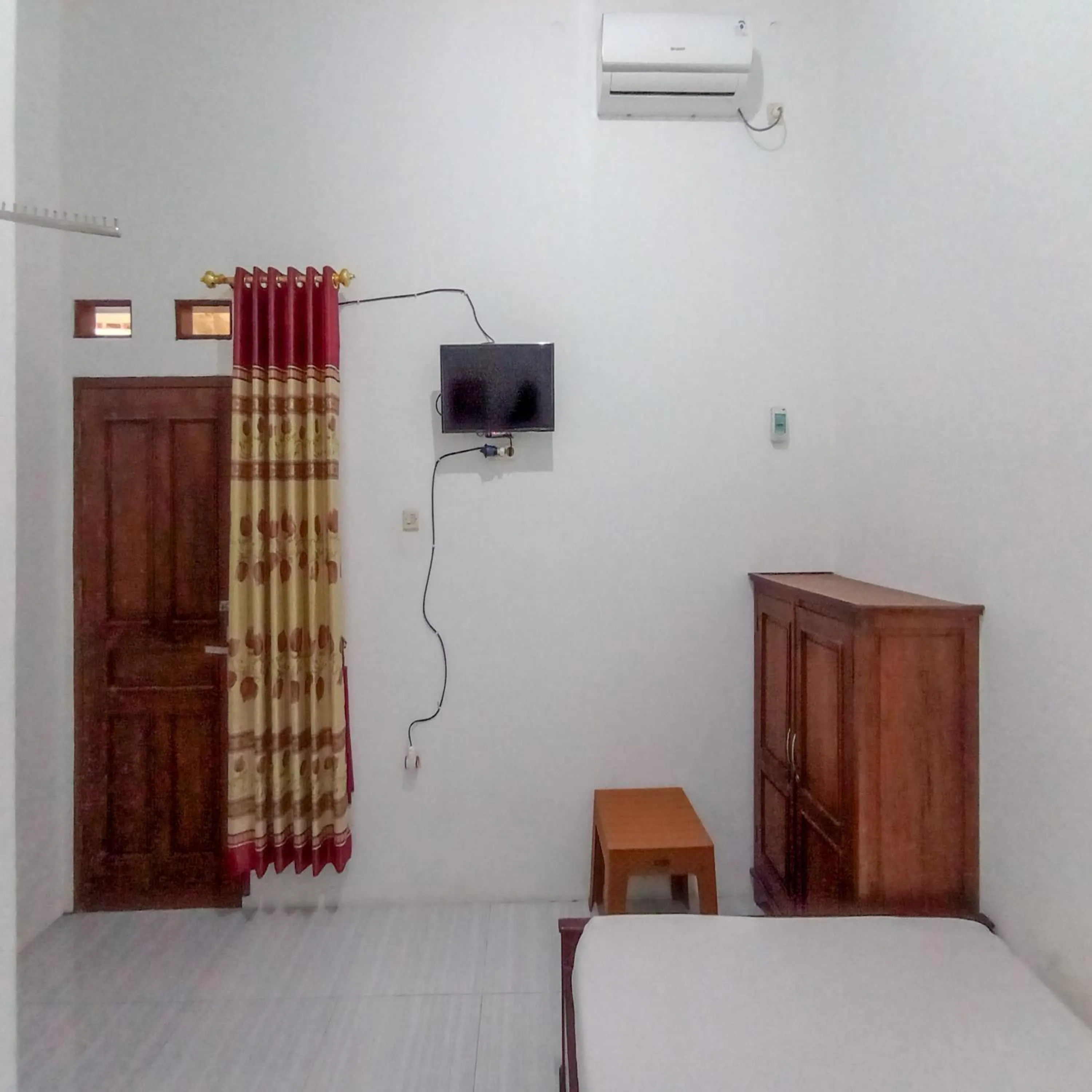 Bedroom, Bed in Hotel Grand New Si Jago Mitra RedDoorz