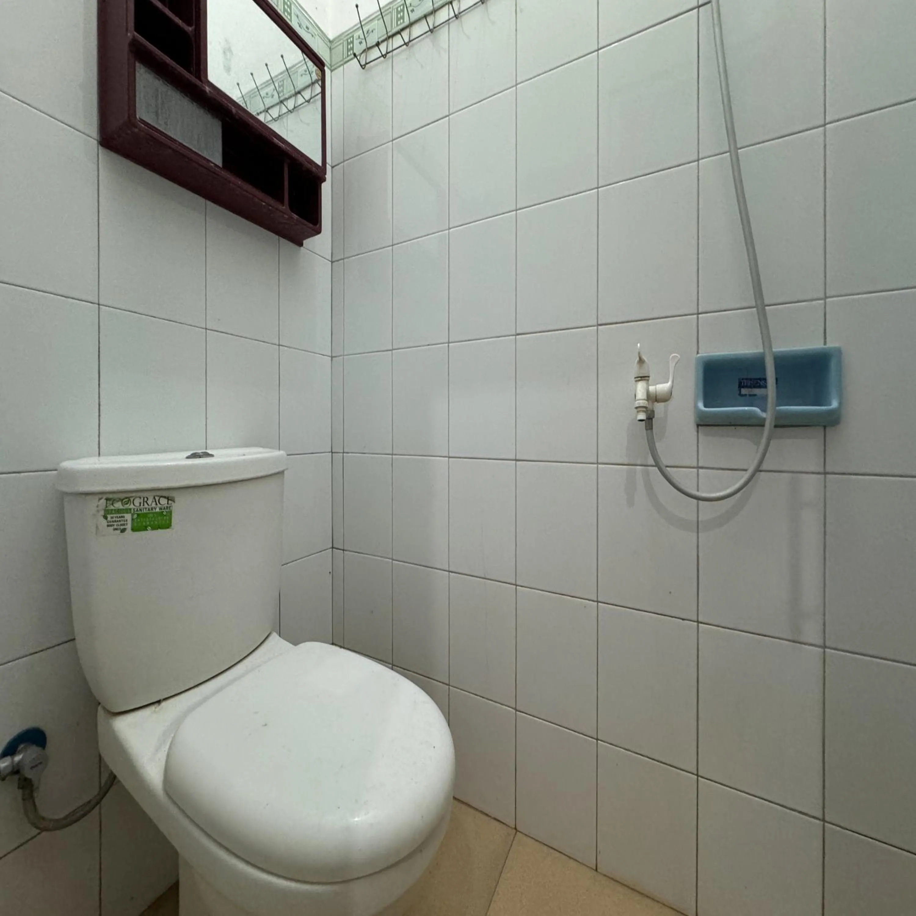 Bathroom in Hotel Grand New Si Jago Mitra RedDoorz