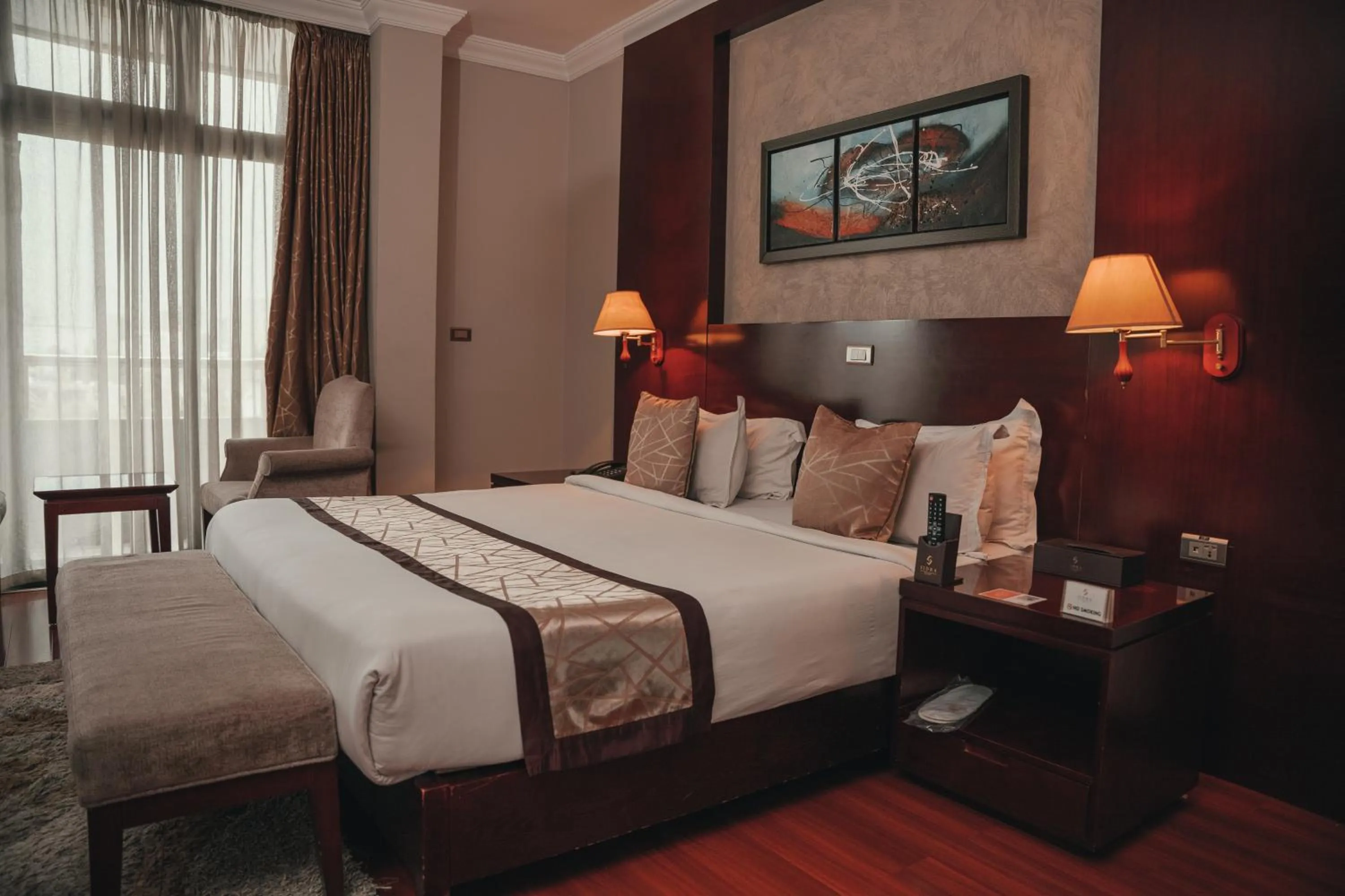 Bed in Sidra International Hotel