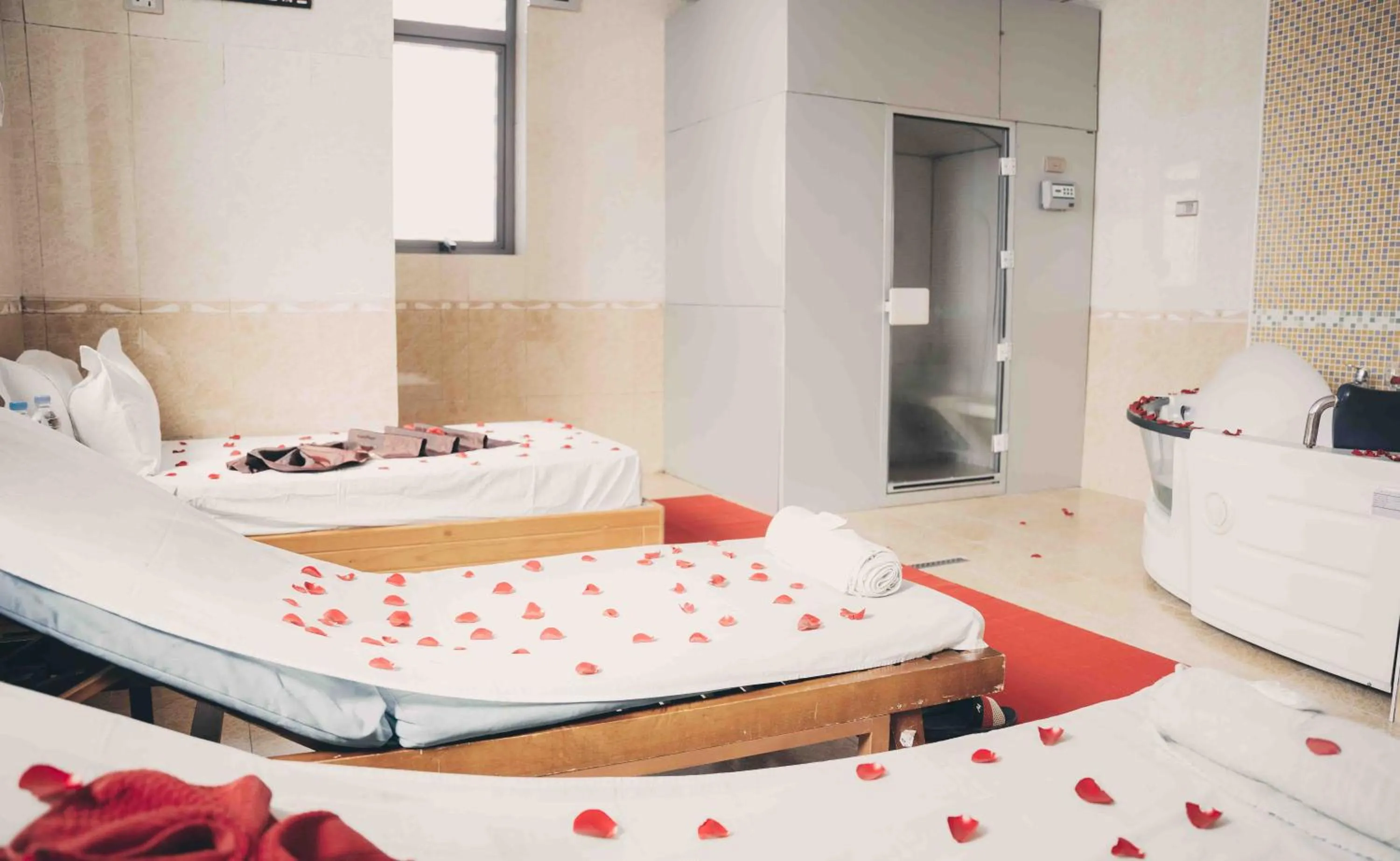 Bed in Sidra International Hotel