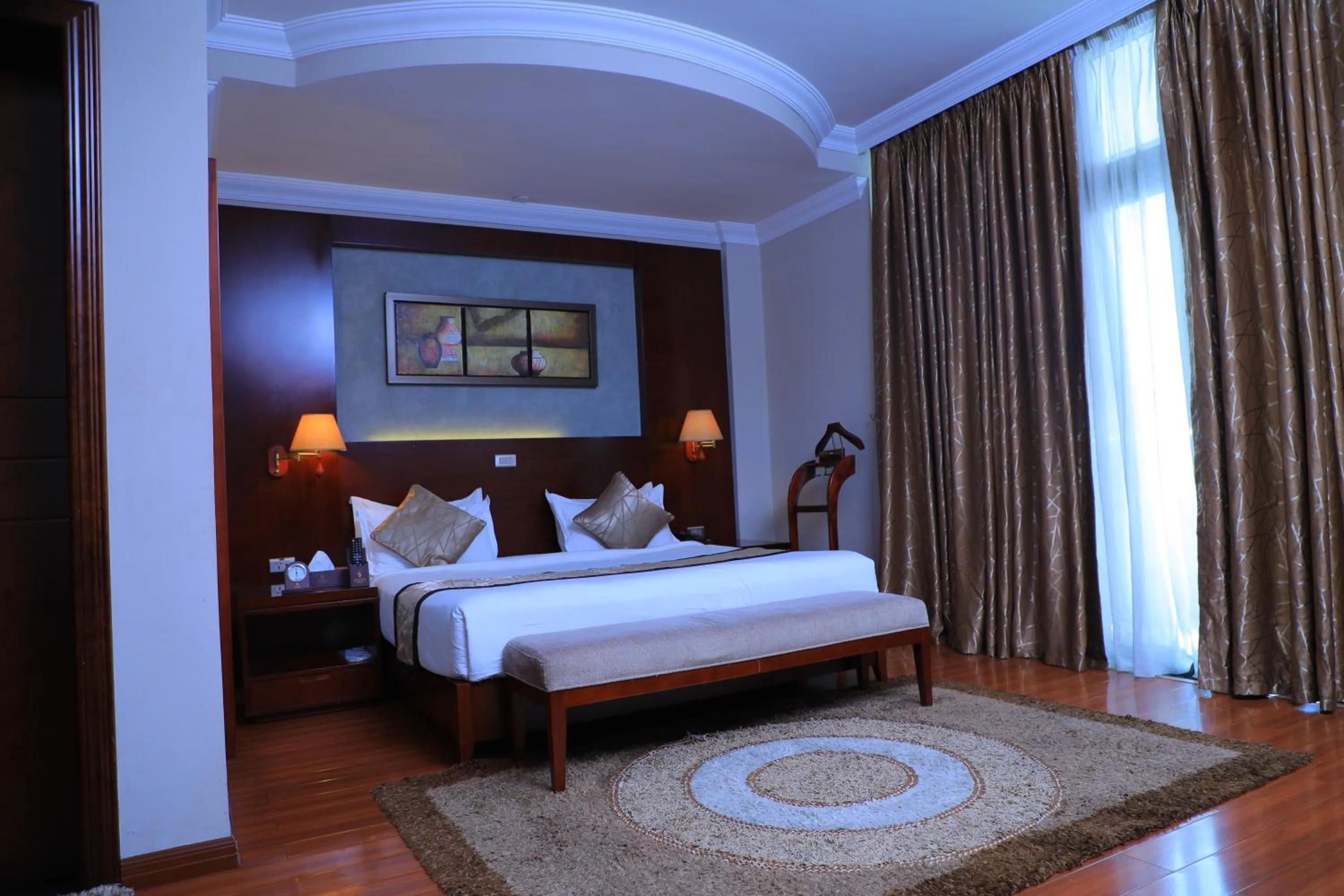 Bed in Sidra International Hotel