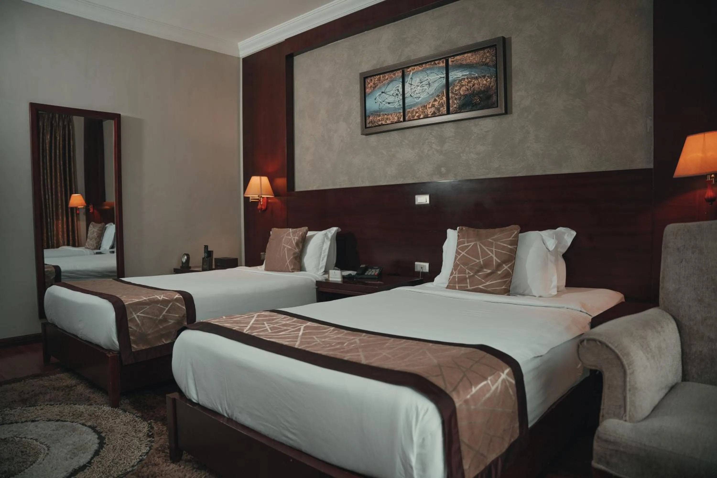 Bed in Sidra International Hotel