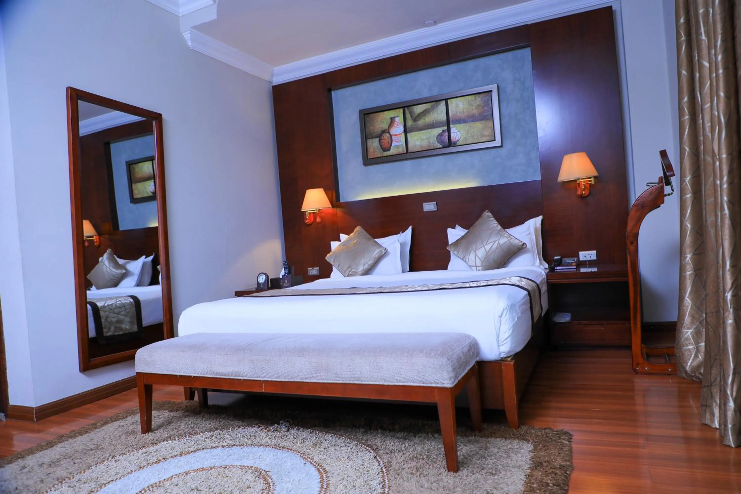 Bed in Sidra International Hotel
