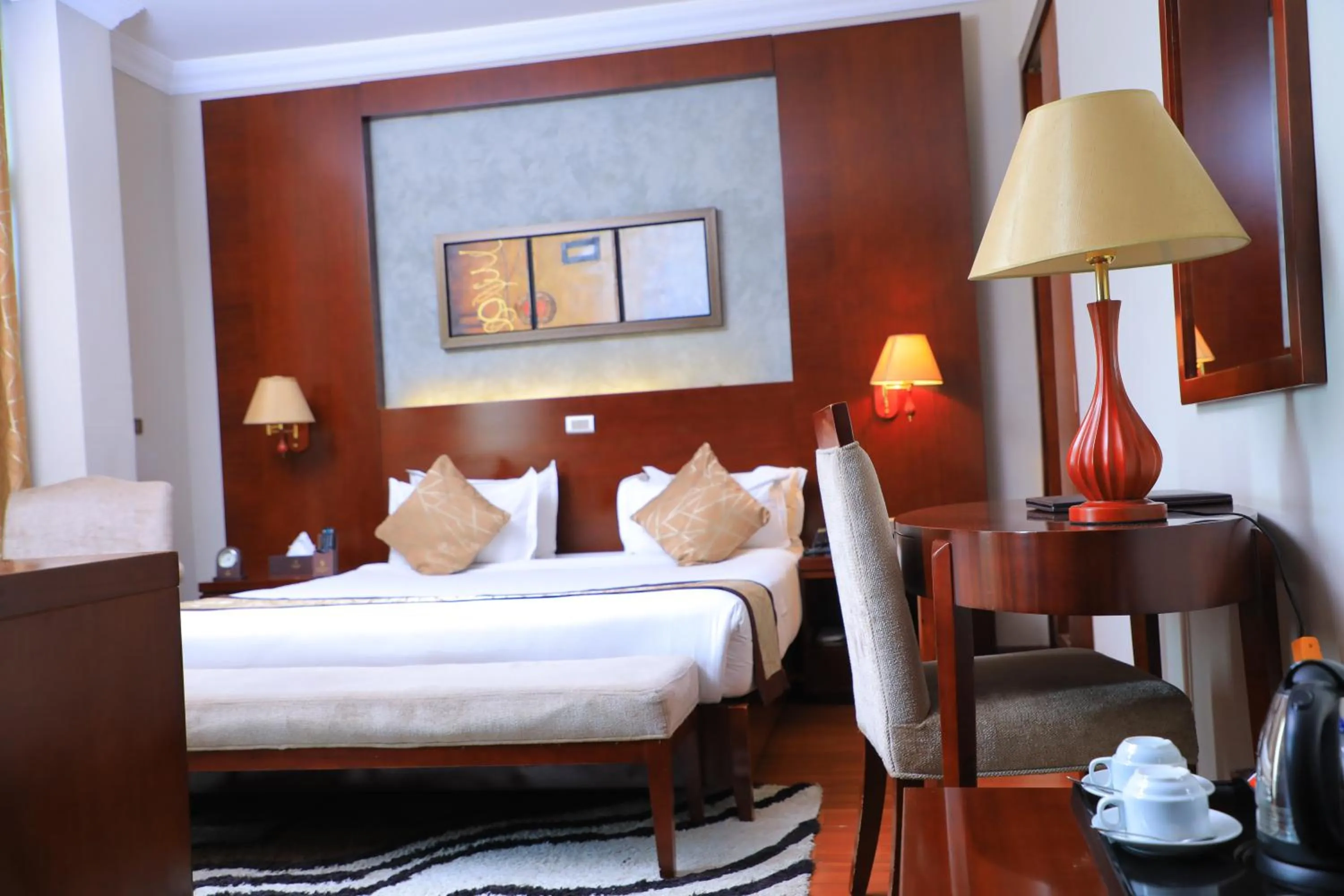 Bed in Sidra International Hotel