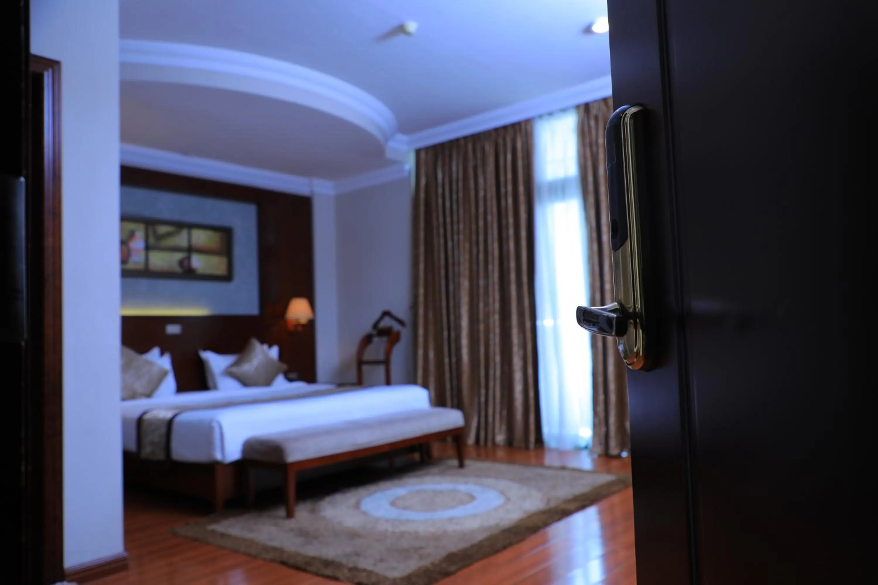 Bed in Sidra International Hotel