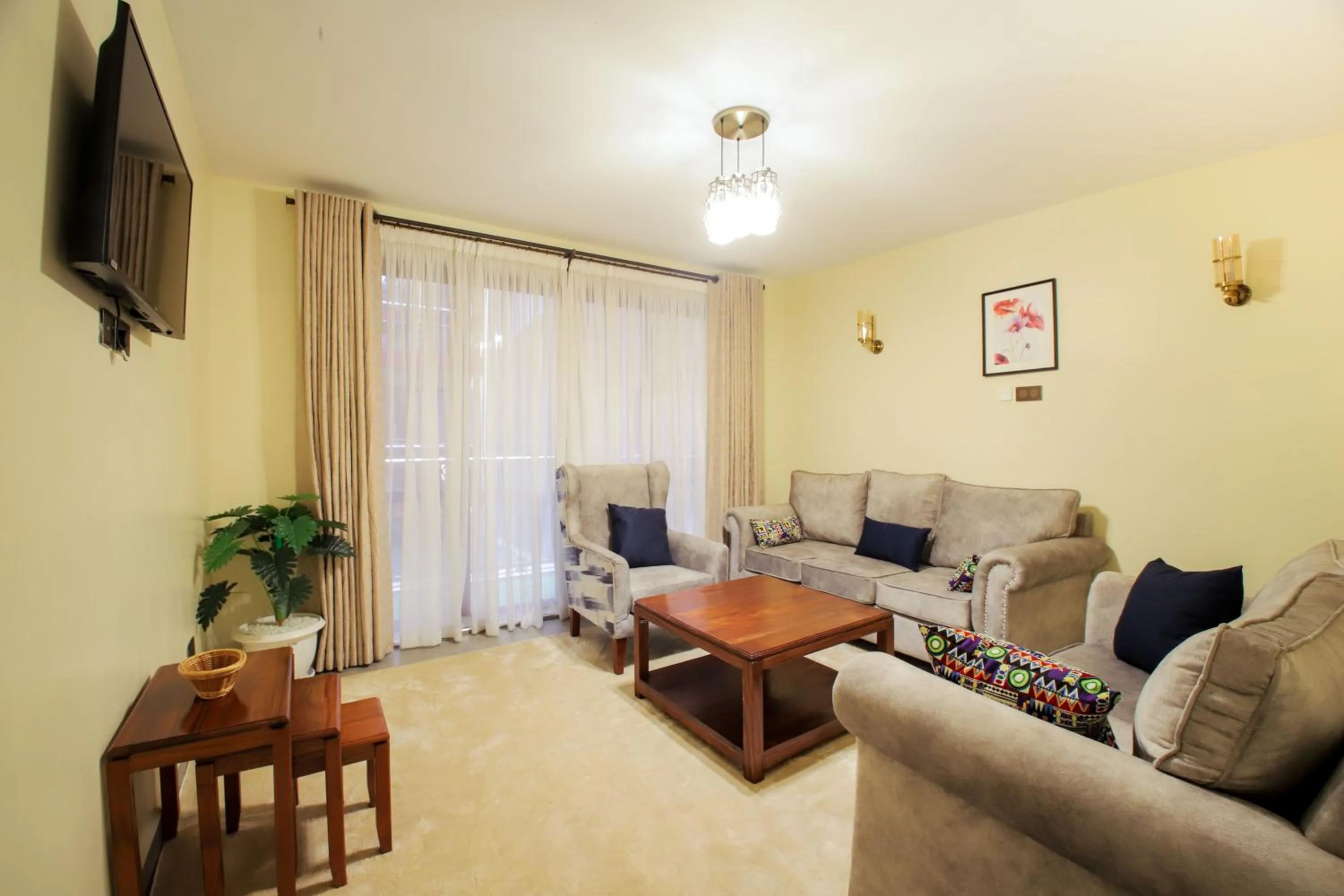 Communal lounge/ TV room in Lantern Serviced Apartments