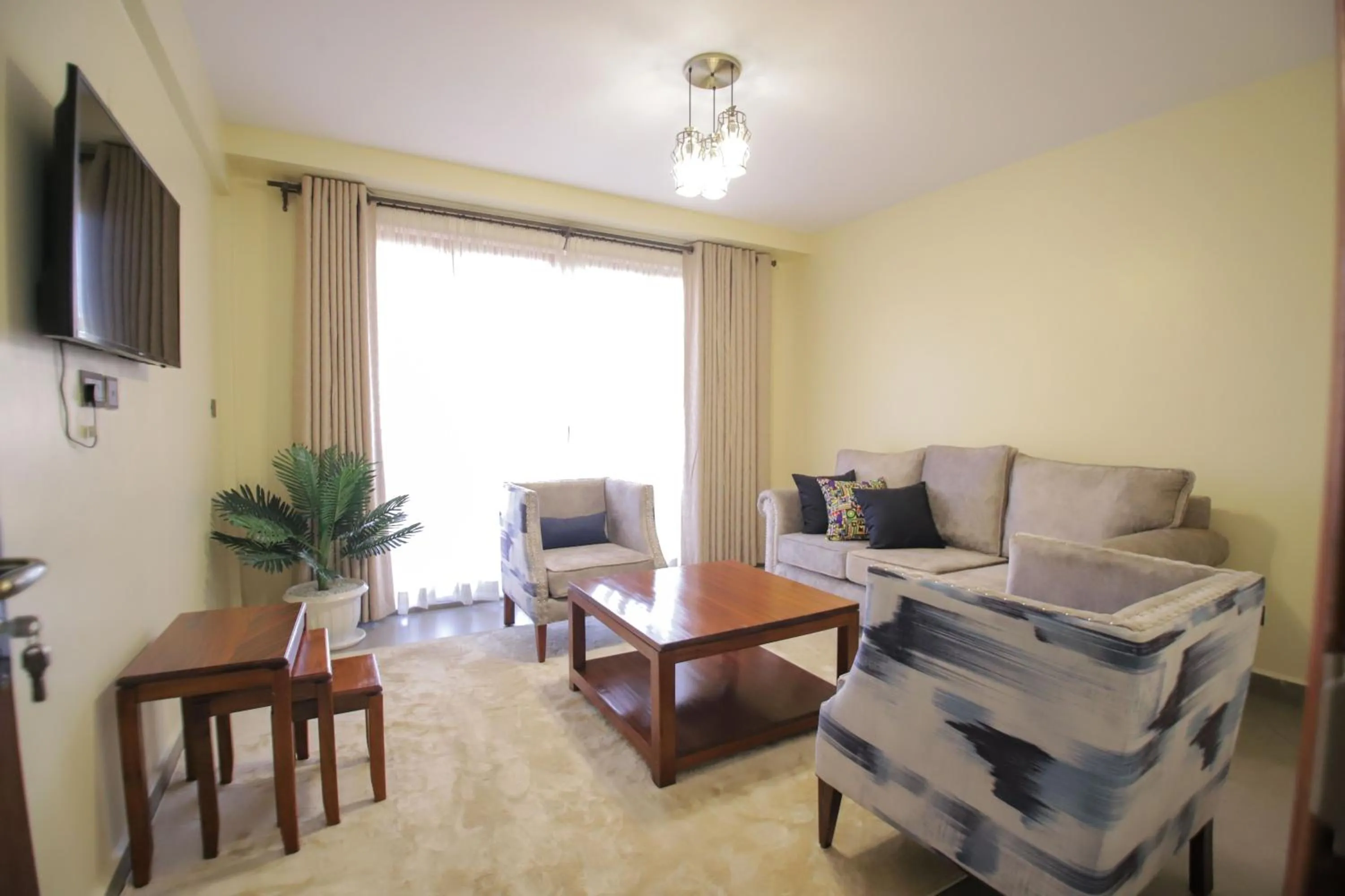Communal lounge/ TV room in Lantern Serviced Apartments