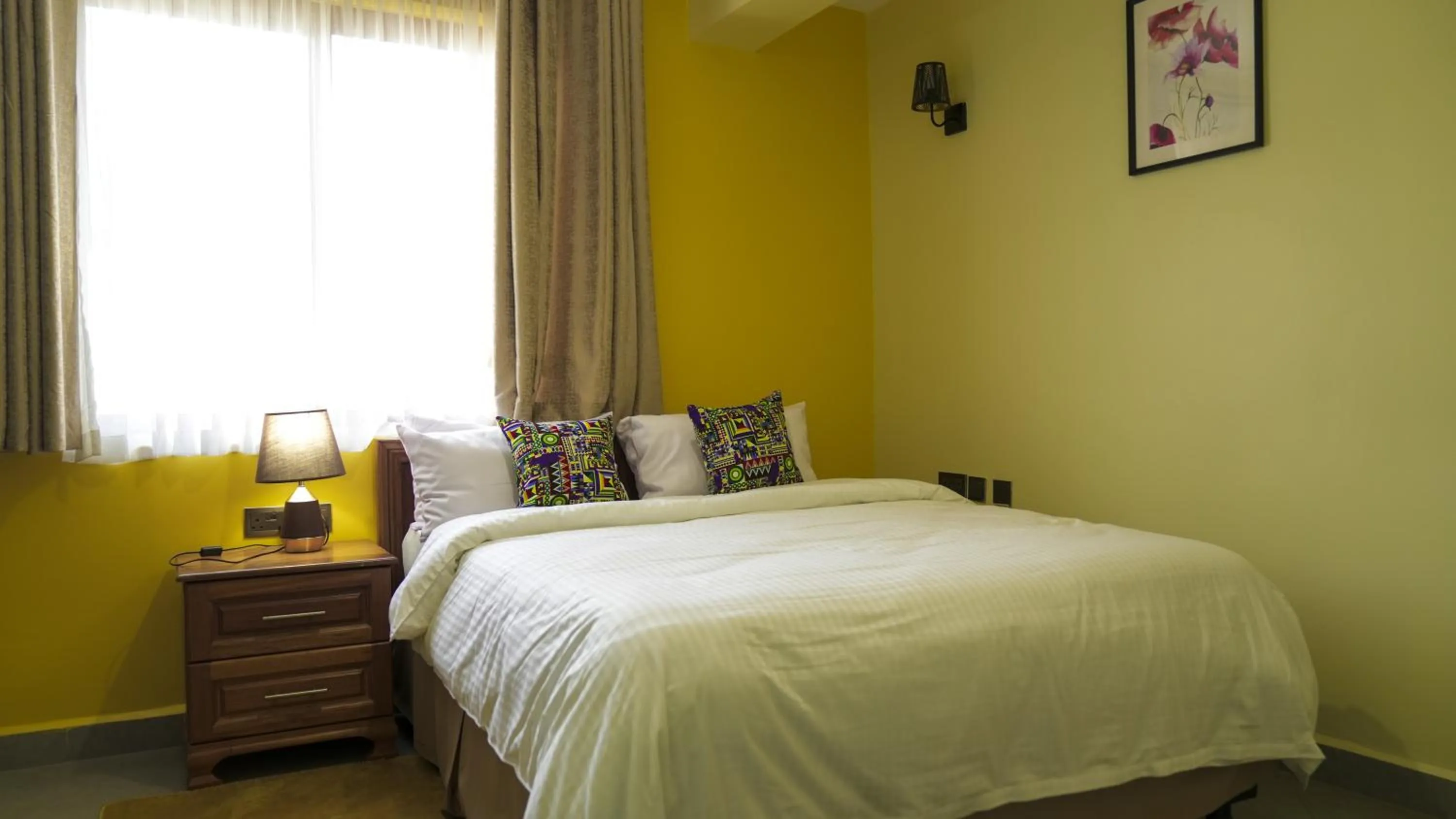 Bed in Lantern Serviced Apartments