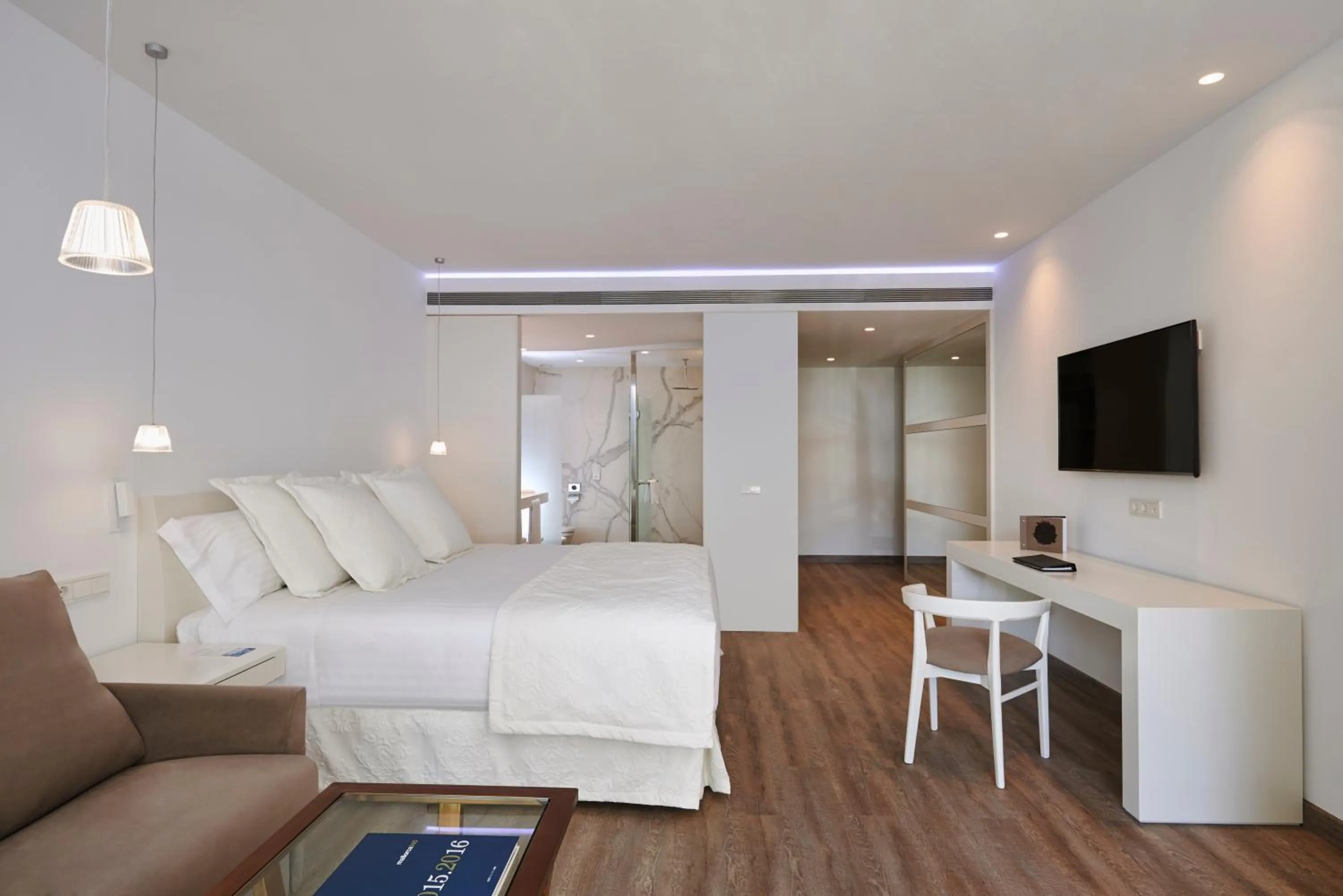 Bed in Melia Cala d'Or Boutique Hotel