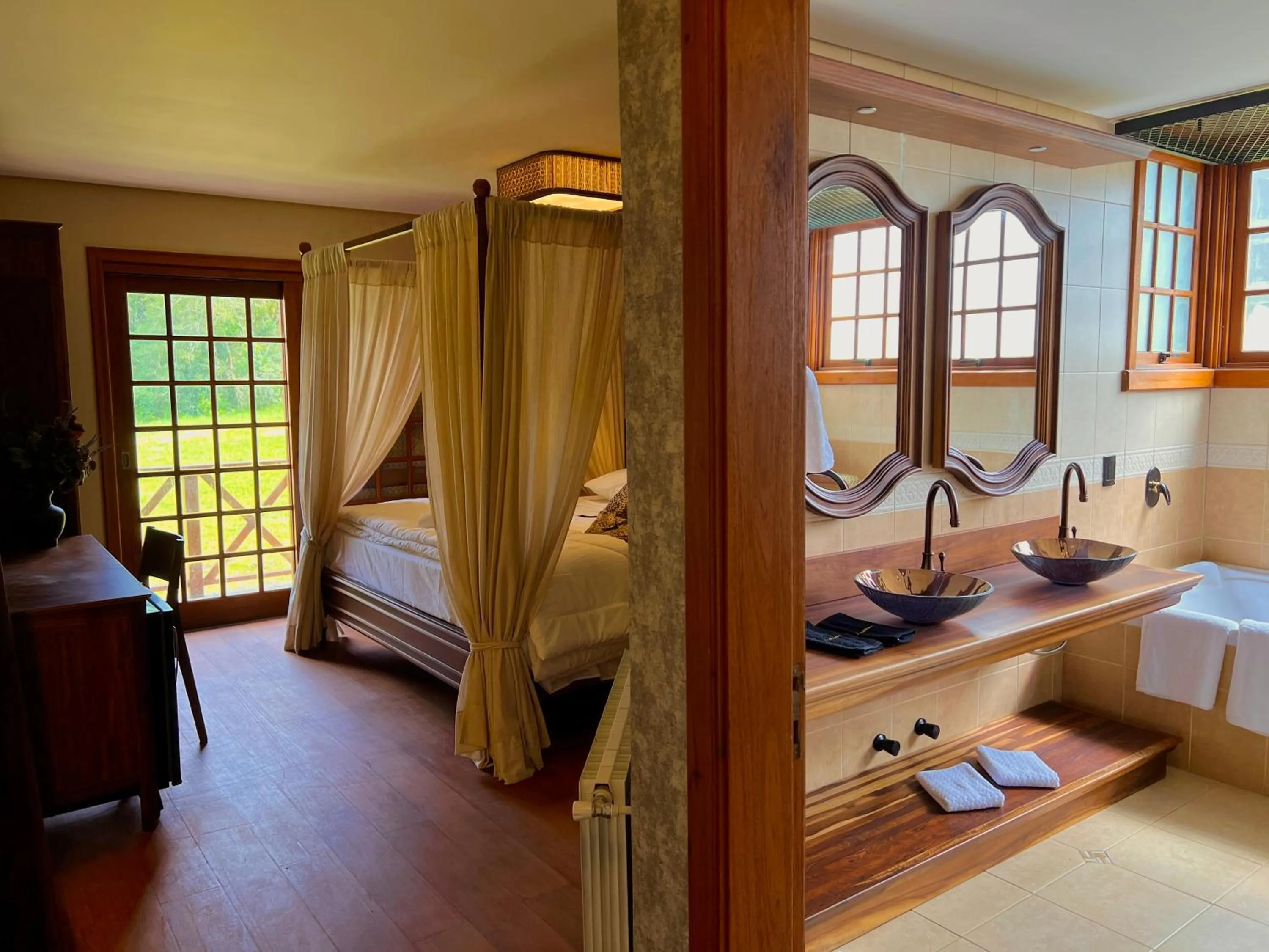 Bed in WoodStone Hotel Fazenda