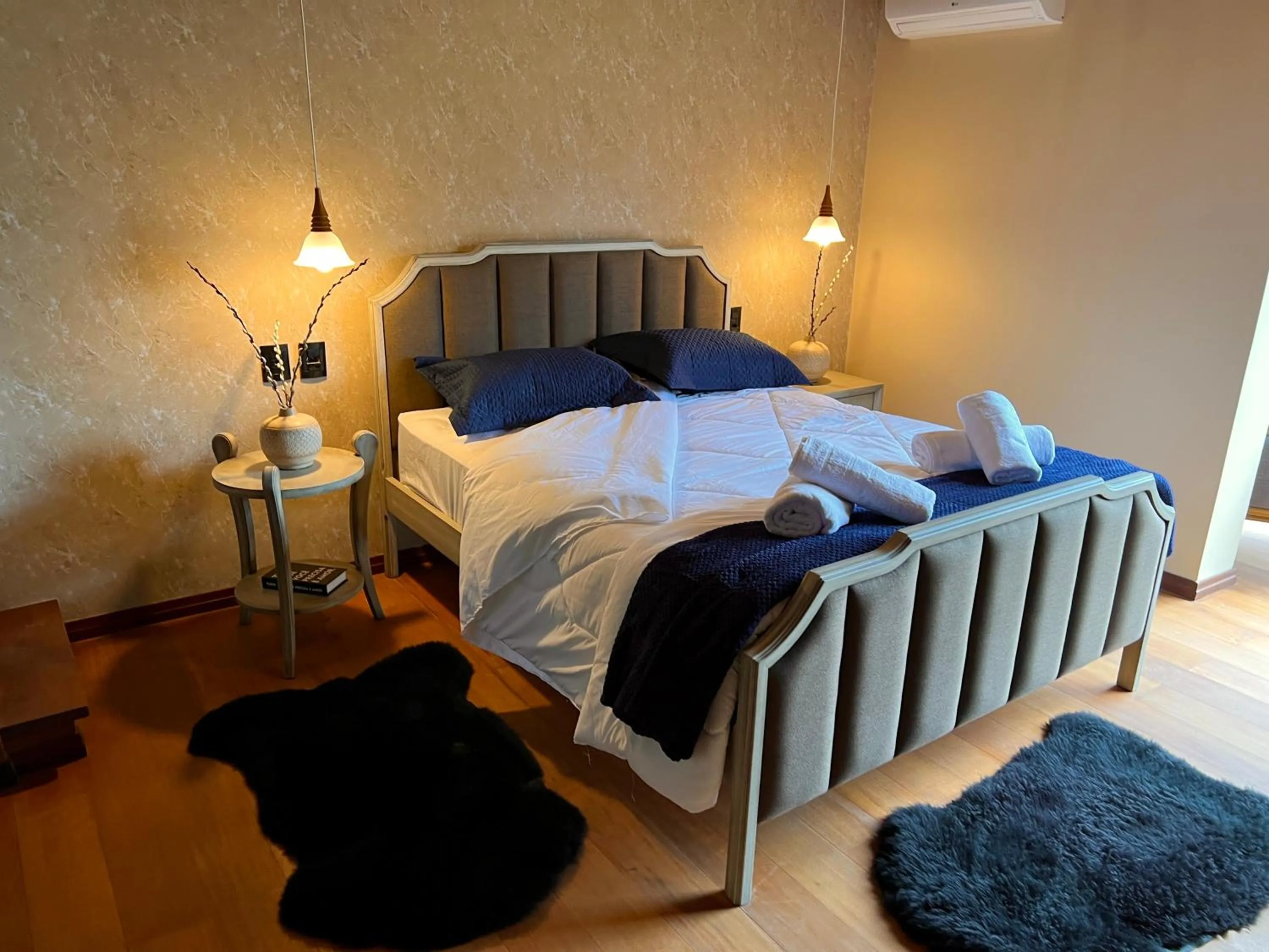 Bed in WoodStone Hotel Fazenda