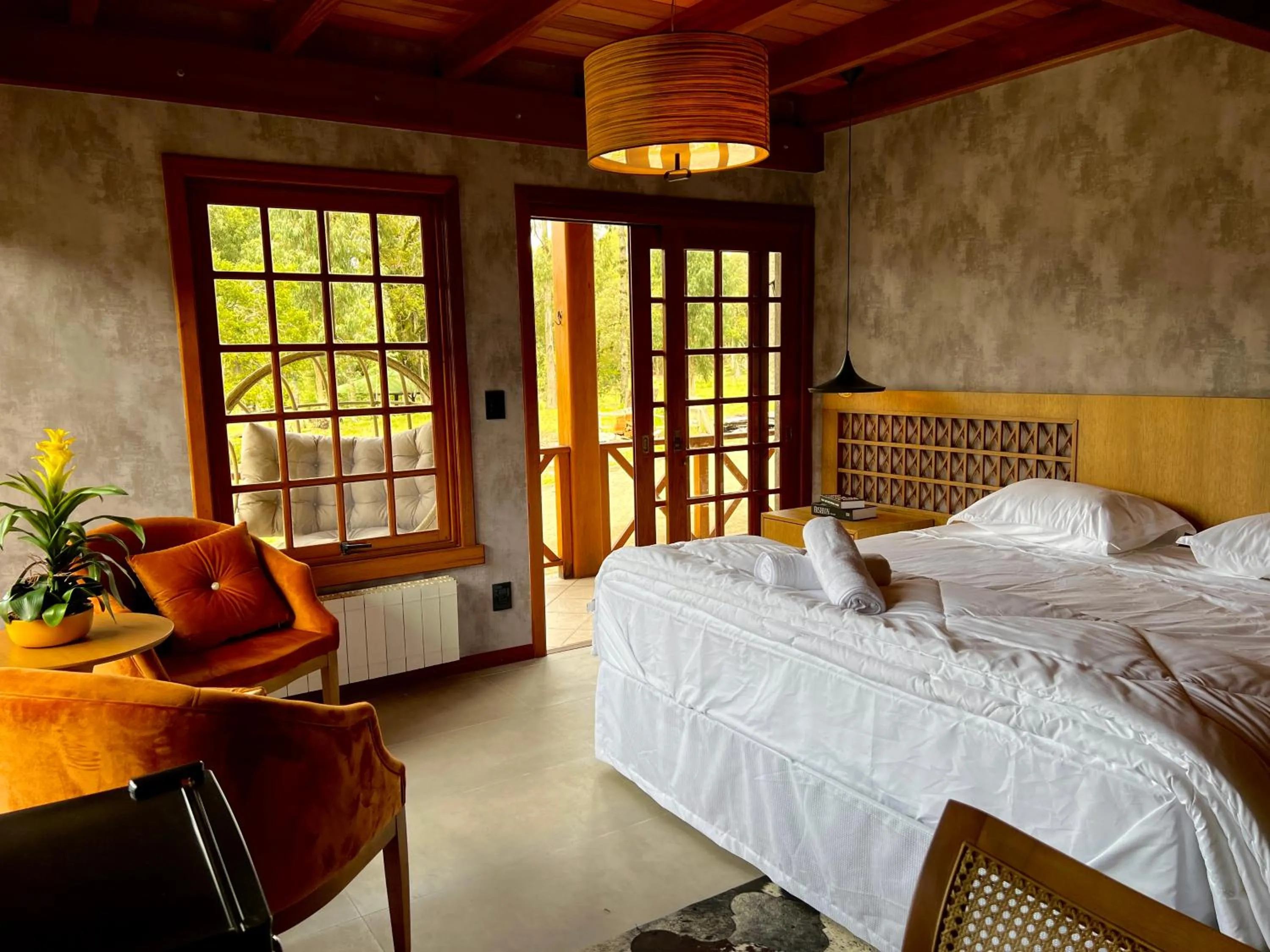 Bed in WoodStone Hotel Fazenda