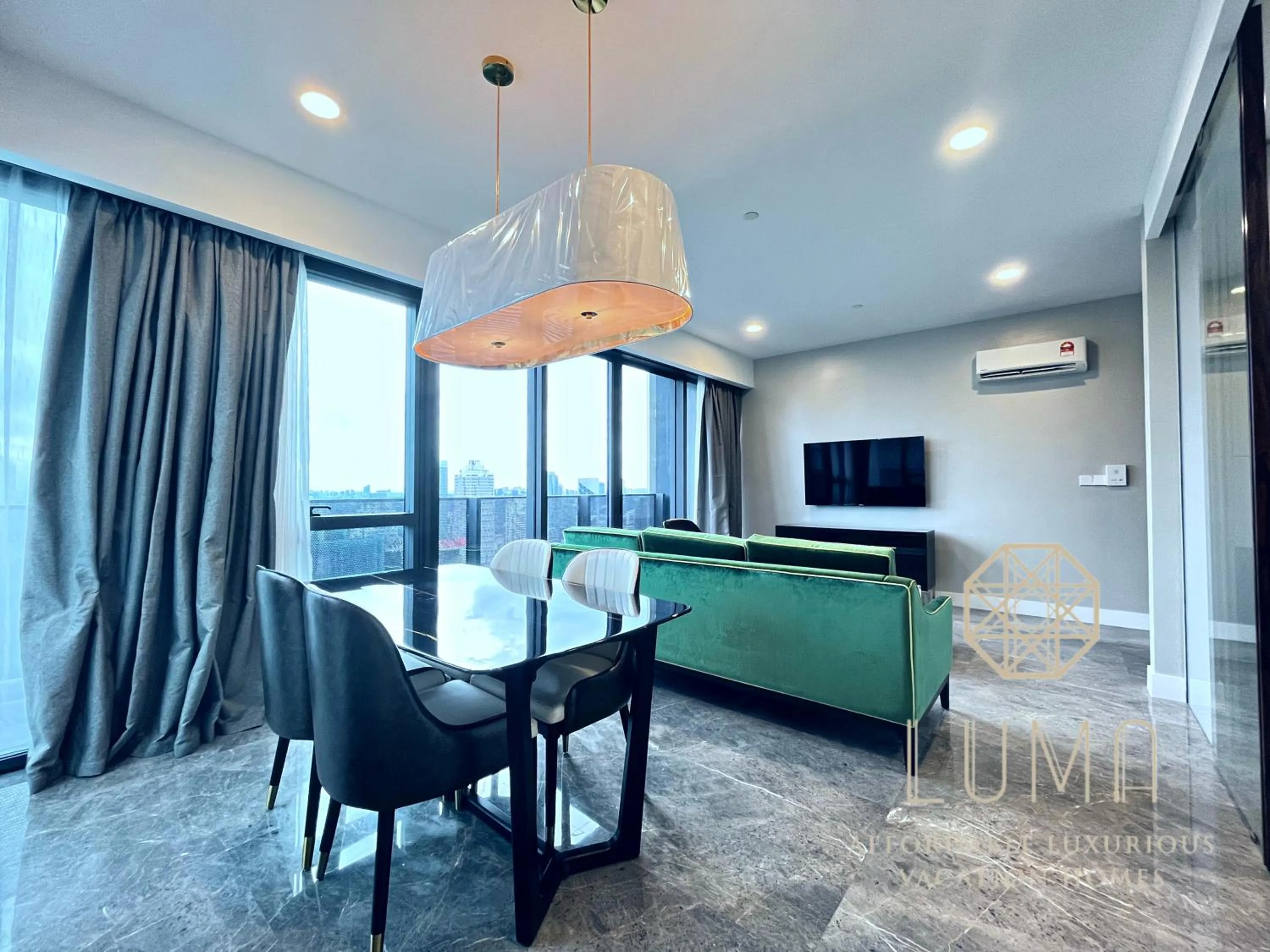 Living room in The Platinum 2 Kuala Lumpur by LUMA