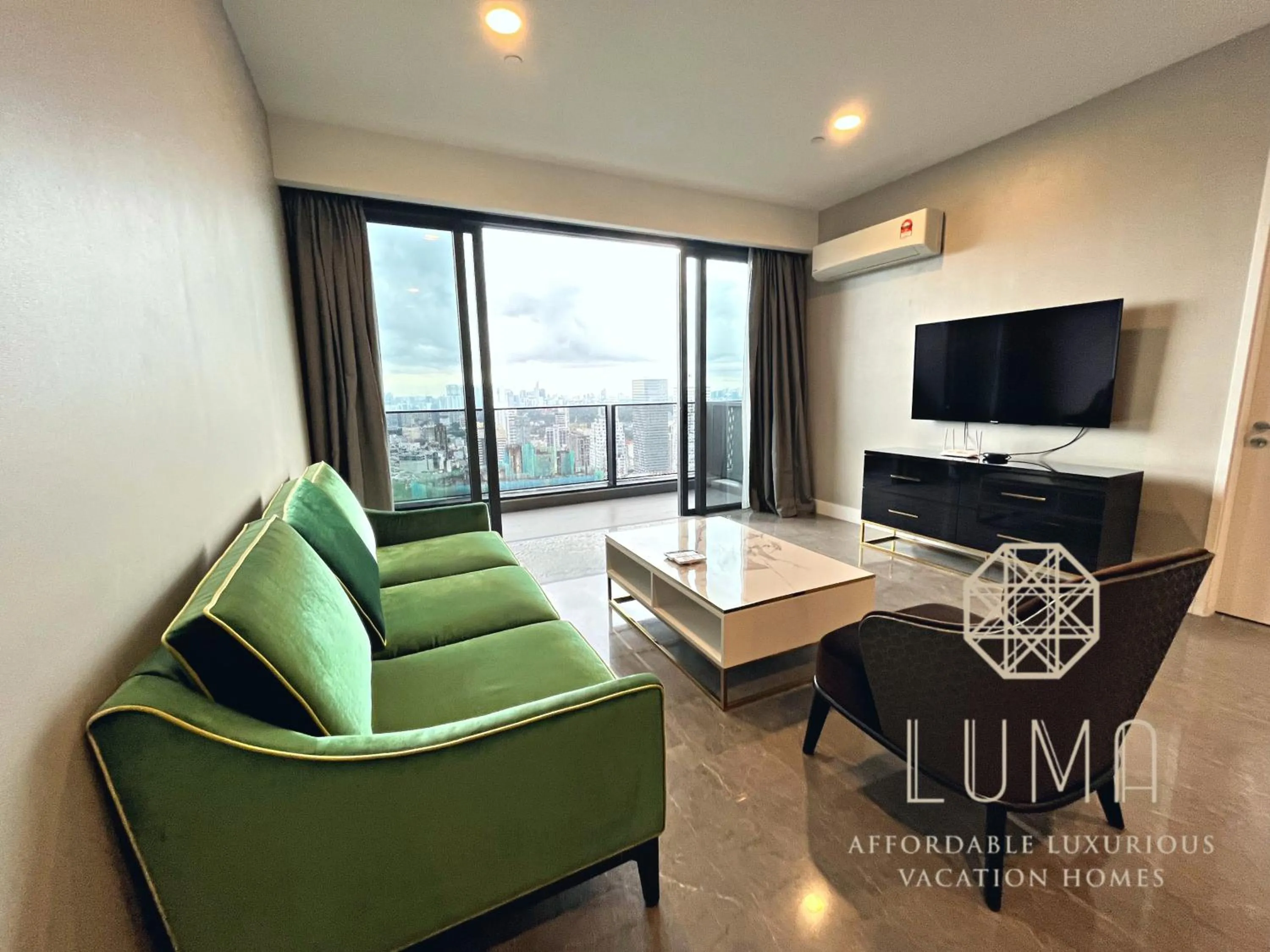 Living room in The Platinum 2 Kuala Lumpur by LUMA