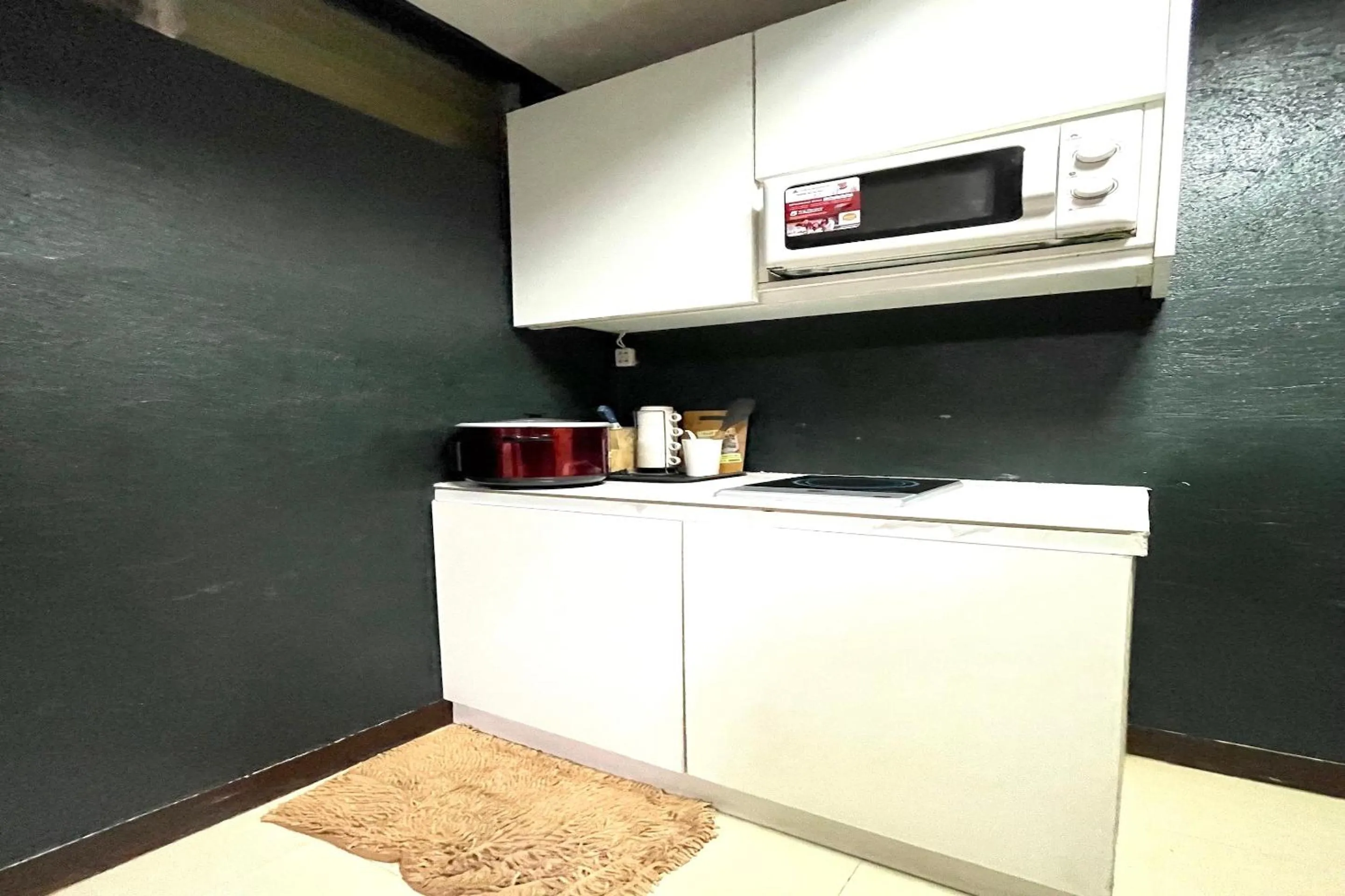 Bedroom in OYO 910 Sabaidee Suites