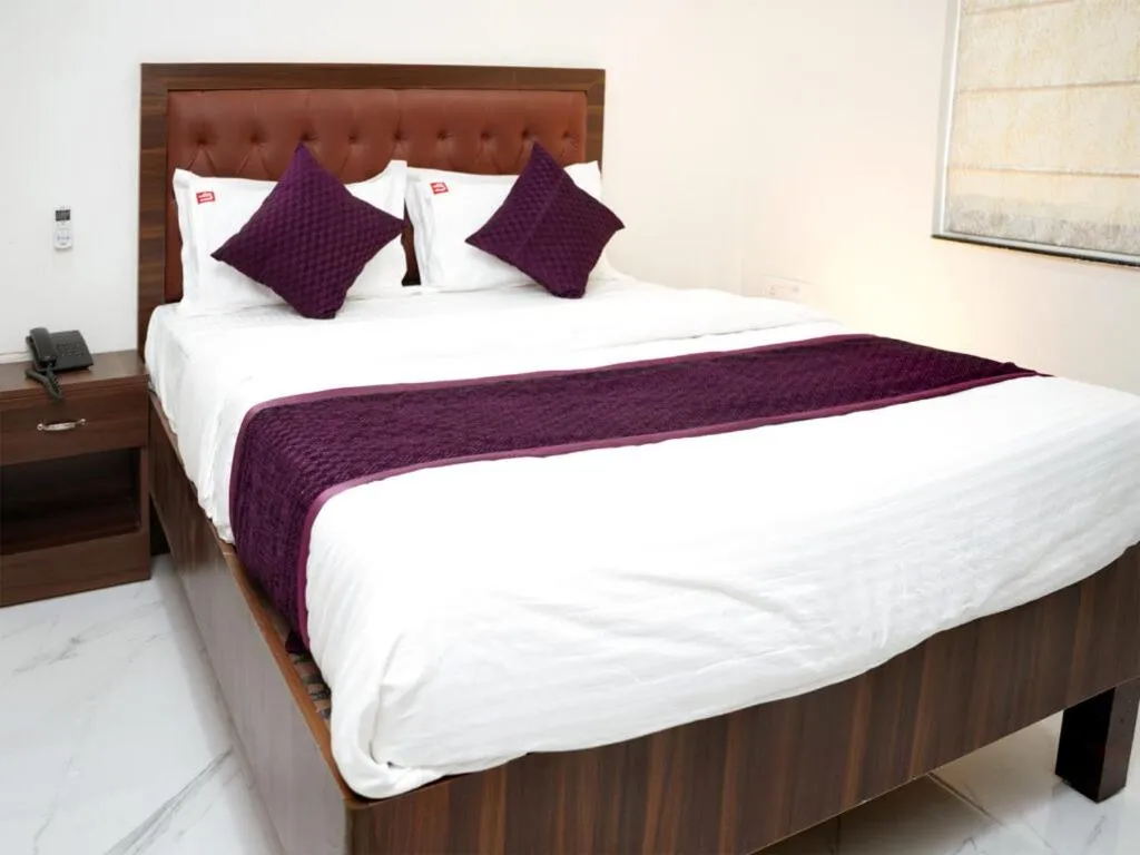 Bed in UNIQUE HOMESTAYS