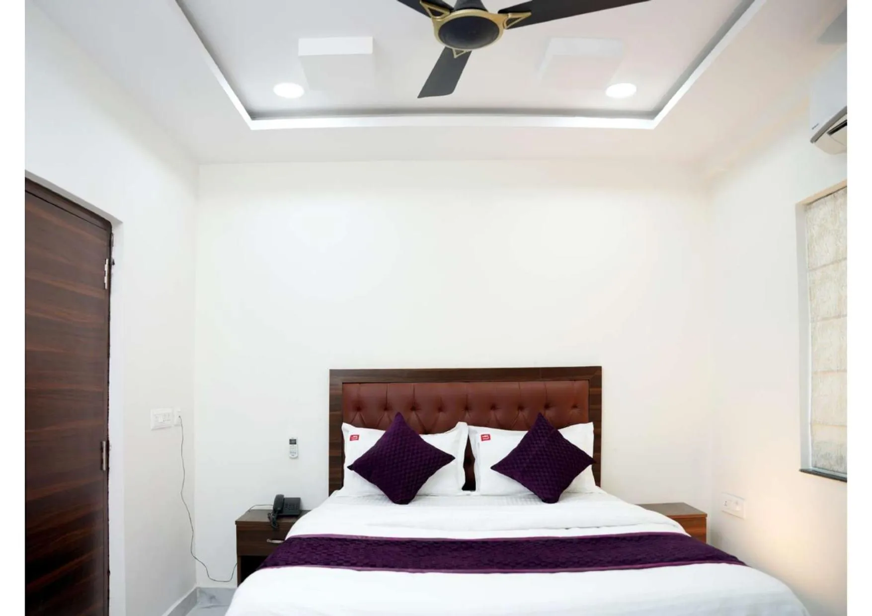 Bed in UNIQUE HOMESTAYS