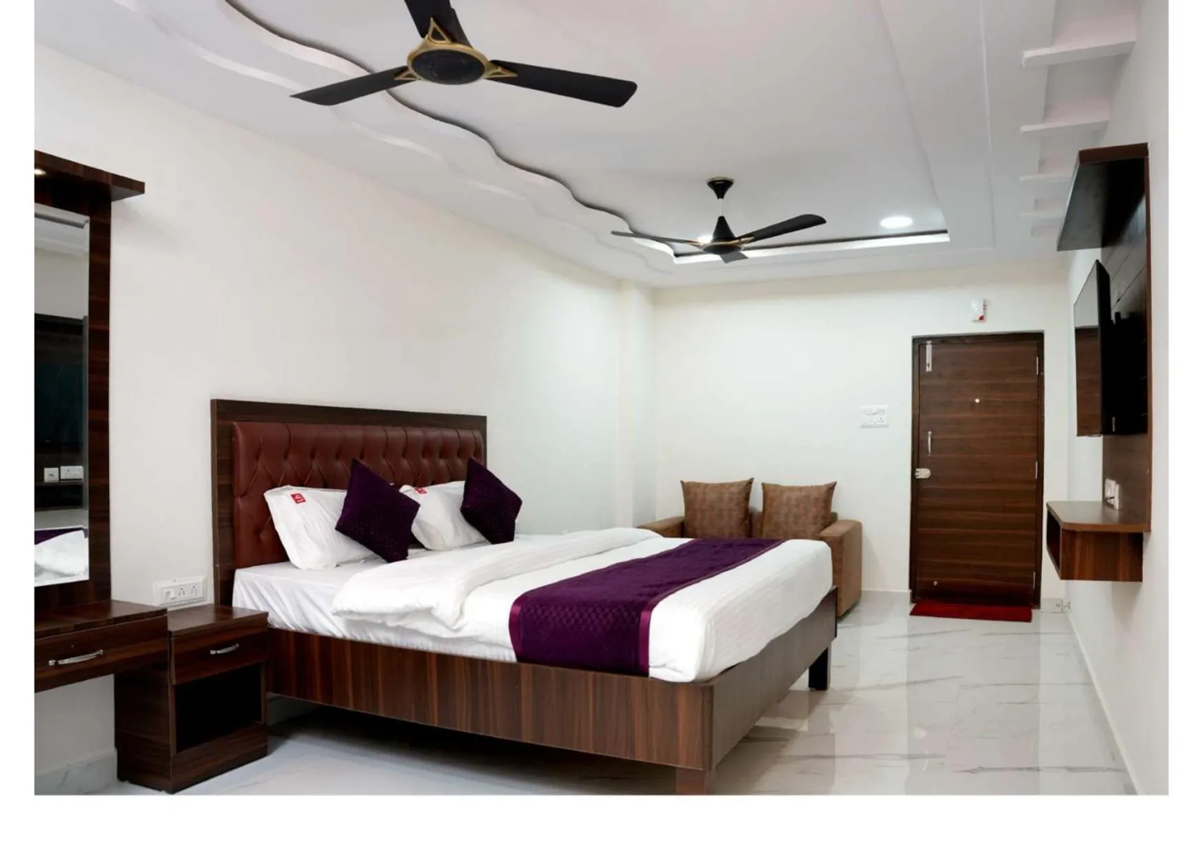 Bed in UNIQUE HOMESTAYS