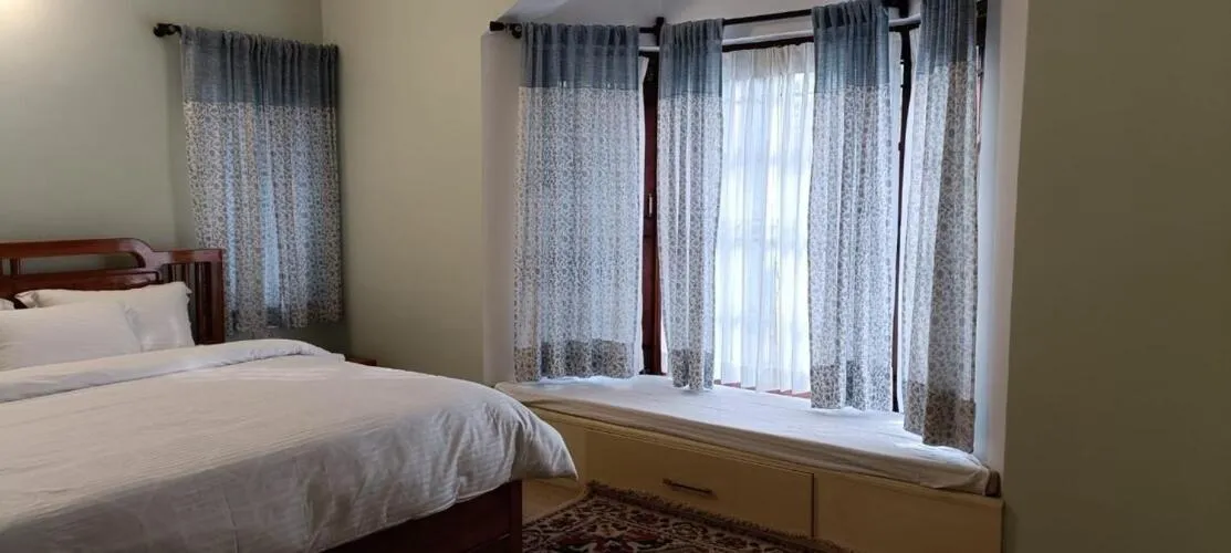 Bed in Habba Kadal Kashmiri Heritage Hotel & Hub