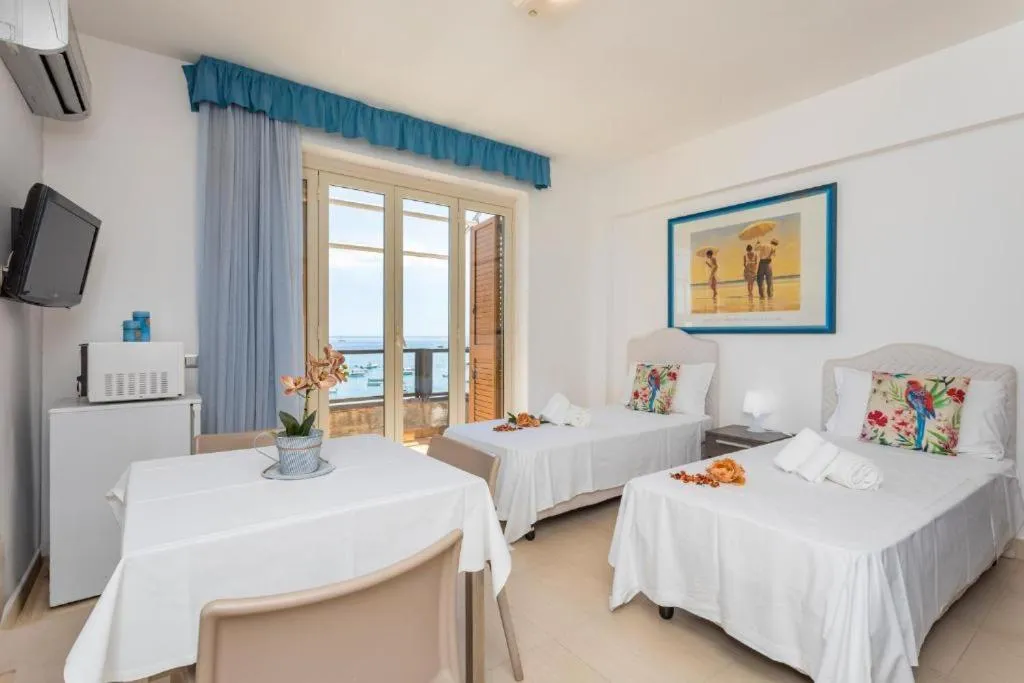 Bed in Sirina House Taormina