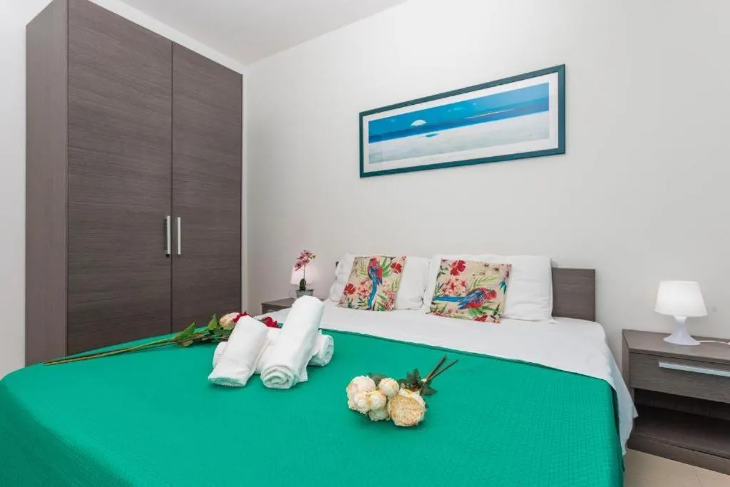 Bed in Sirina House Taormina