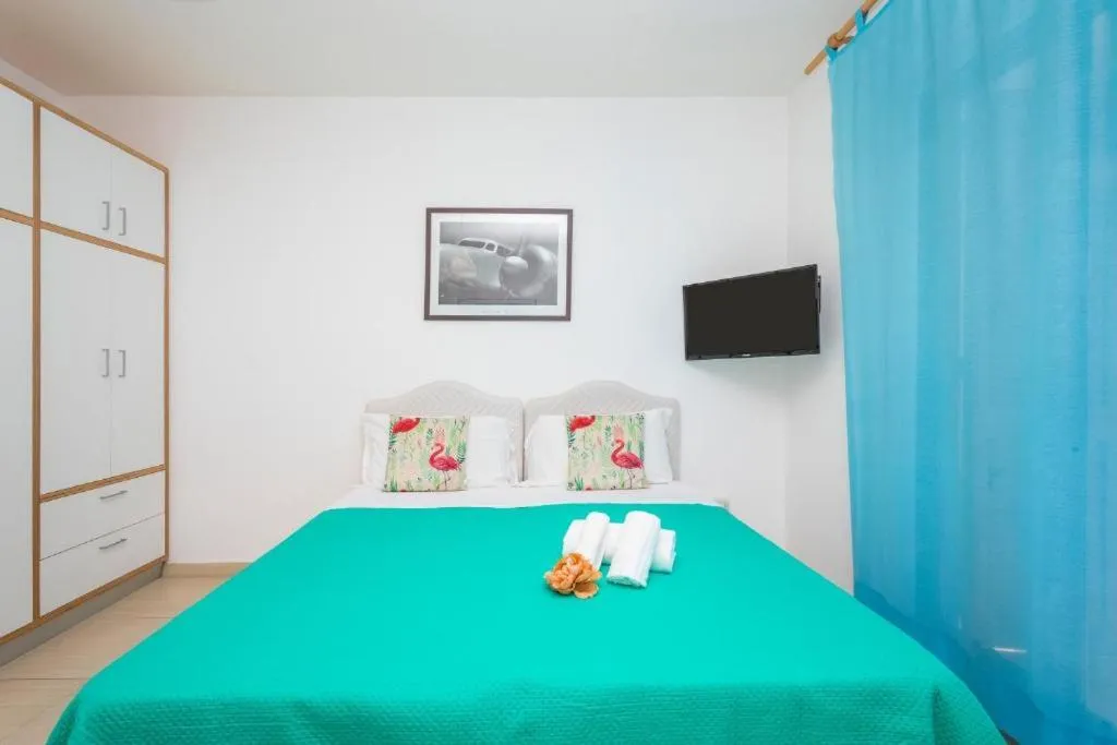 Bed in Sirina House Taormina