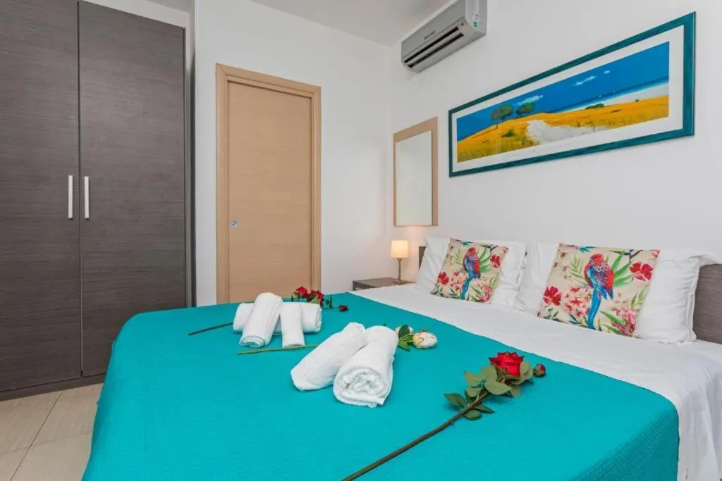 Bed in Sirina House Taormina