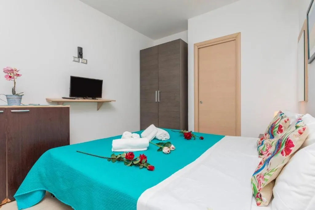 Bed in Sirina House Taormina