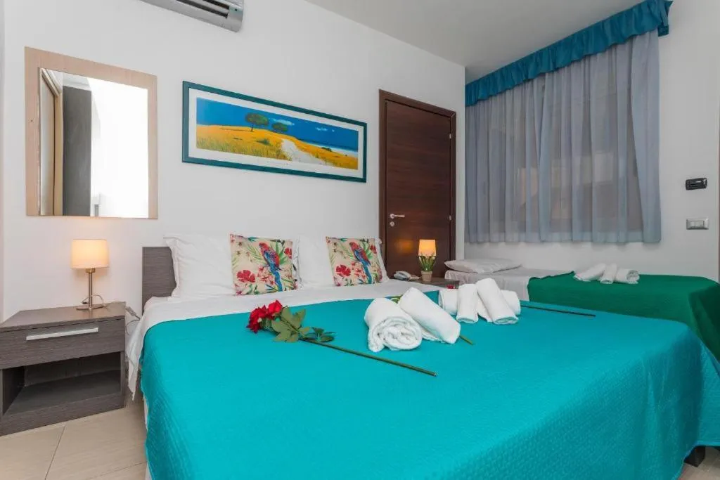 Bed in Sirina House Taormina