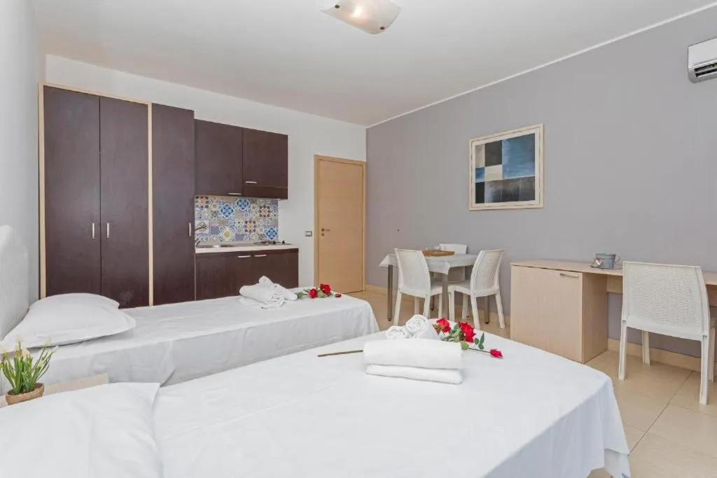 Bed in Sirina House Taormina