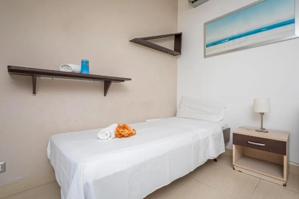 Bed in Sirina House Taormina
