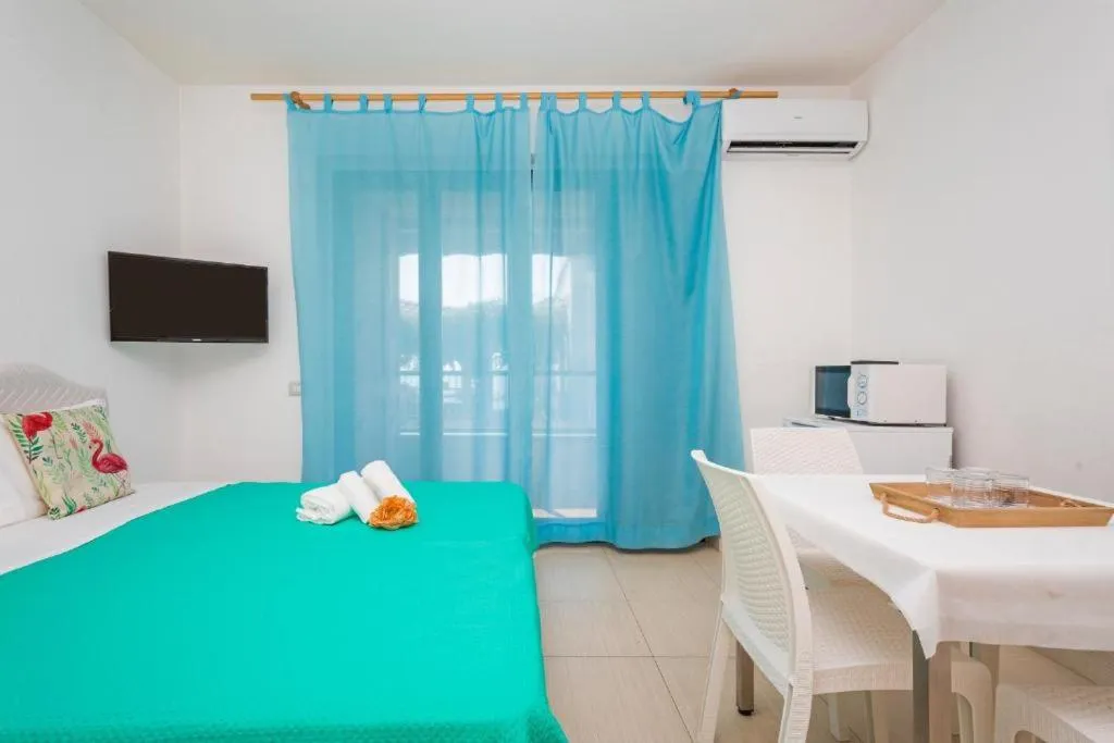 Bed in Sirina House Taormina