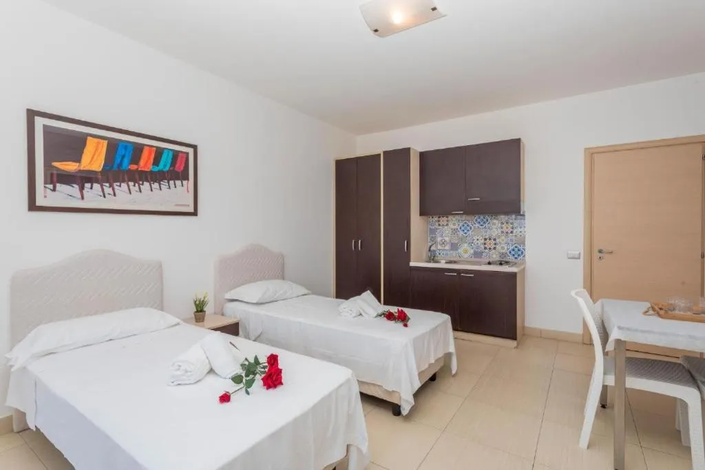 Bed in Sirina House Taormina