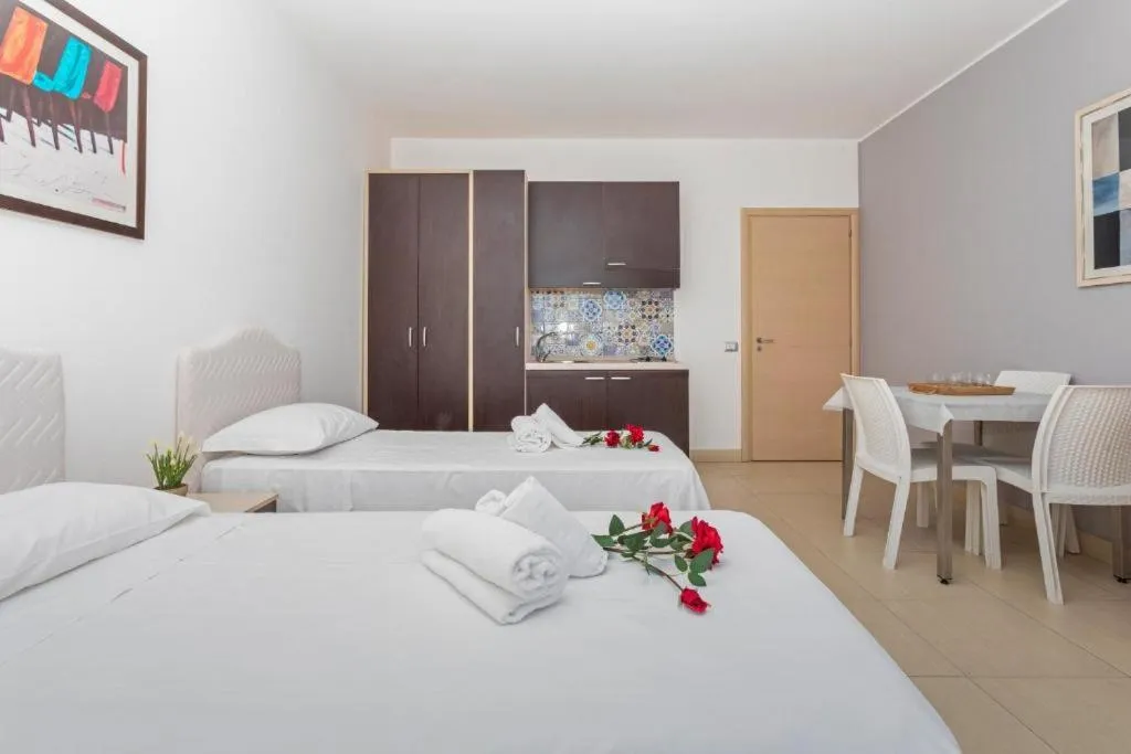 Bed in Sirina House Taormina