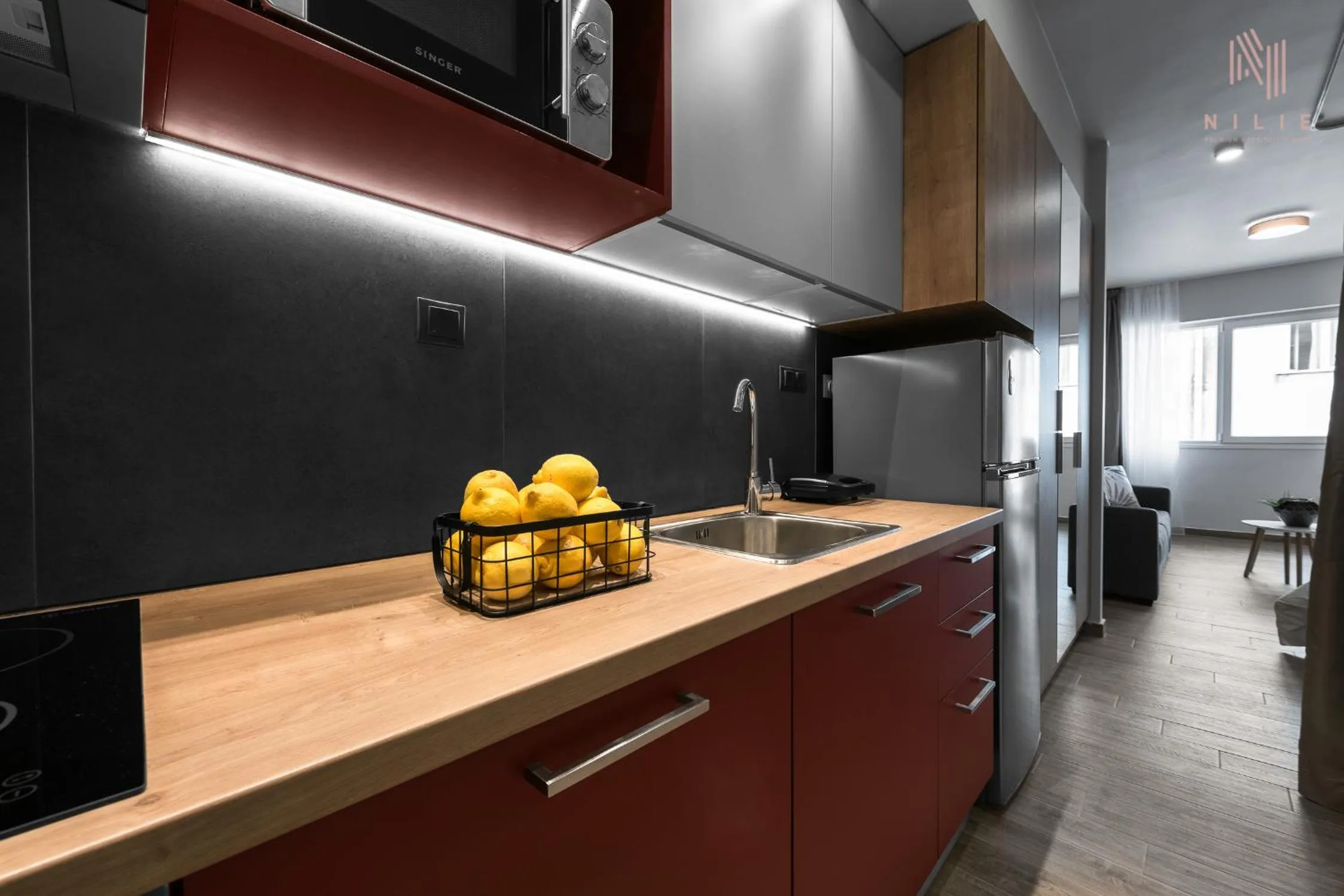 Kitchen or kitchenette in Big Apple, Nilie Hospitality MGMT