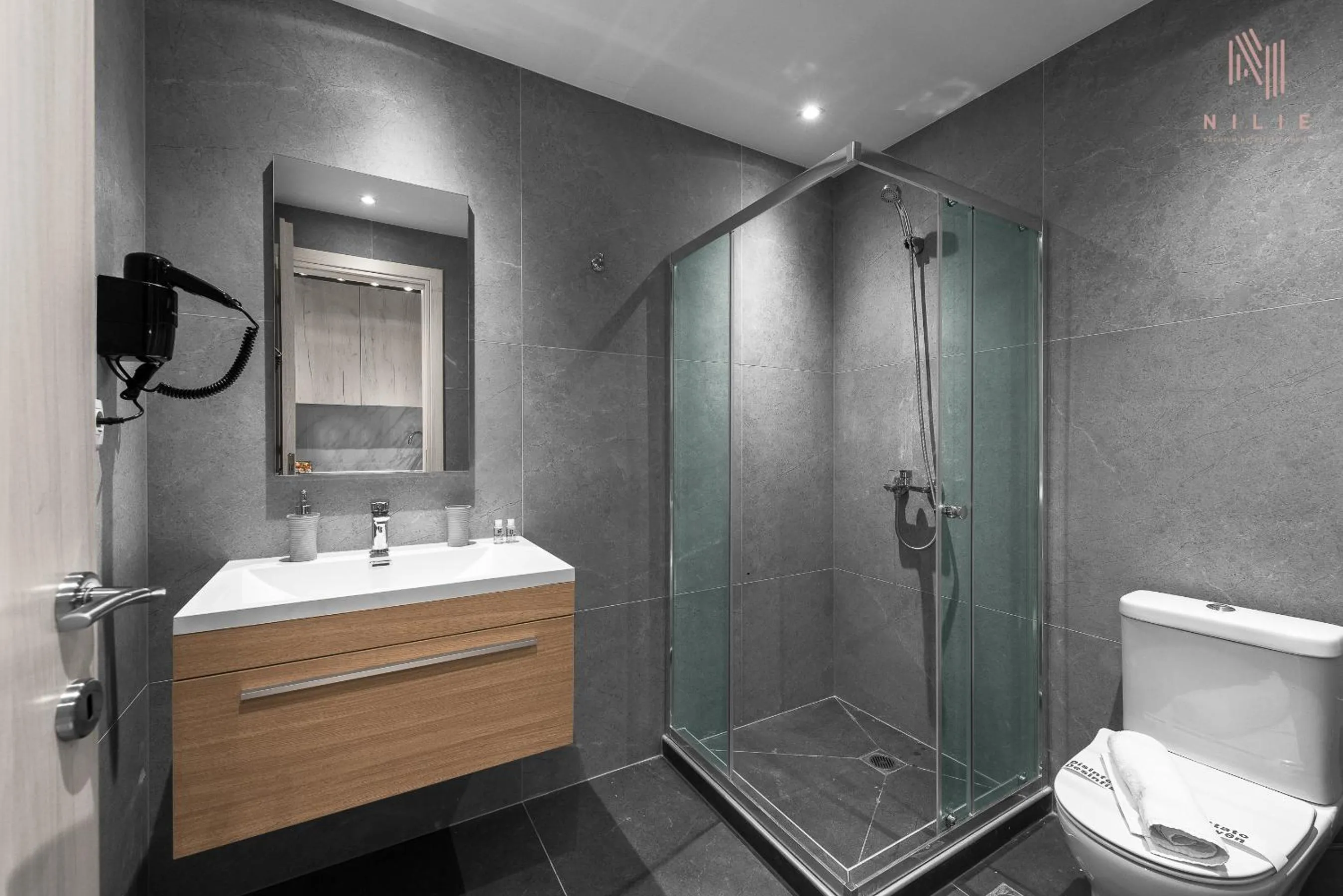 Shower in Big Apple, Nilie Hospitality MGMT