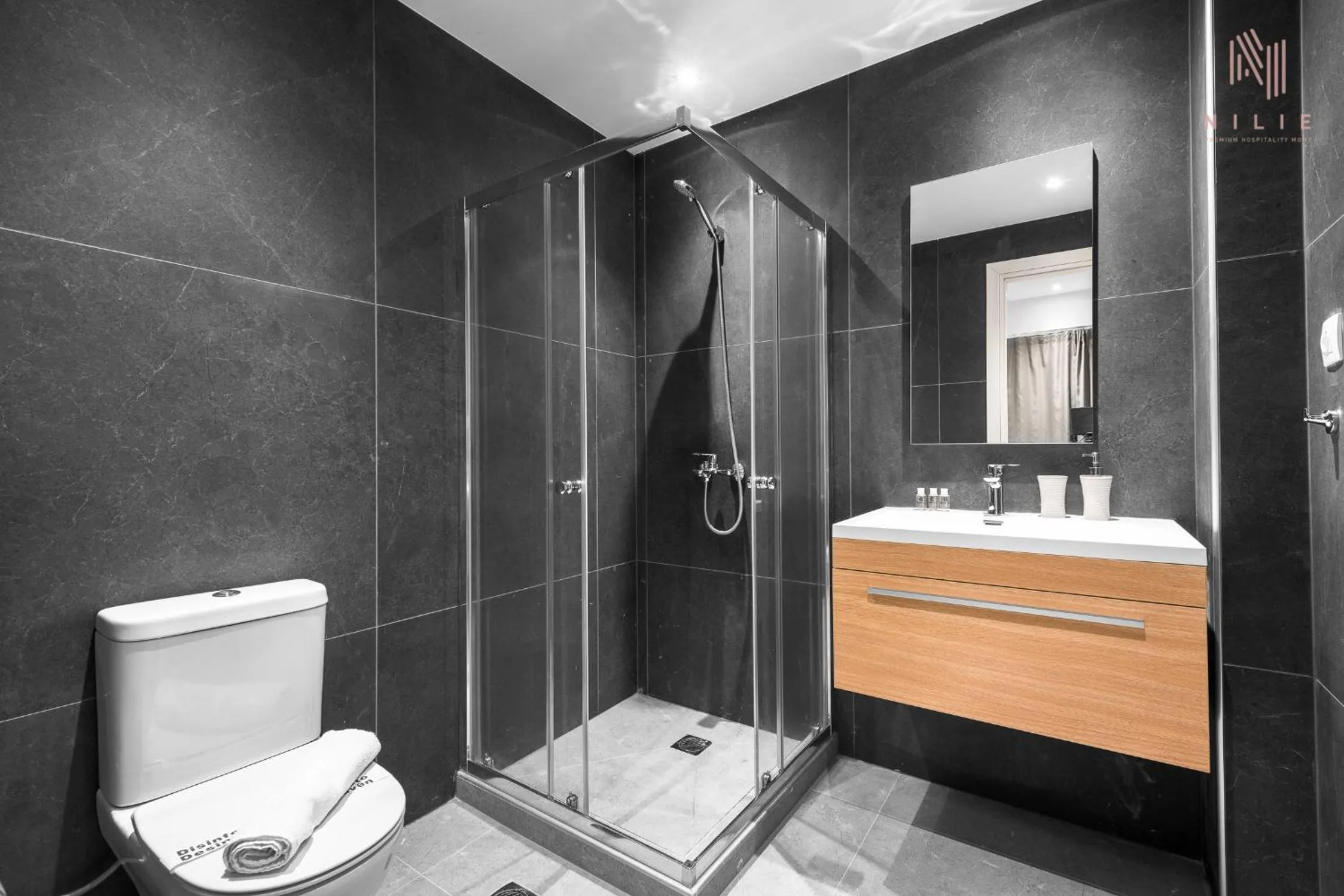 Shower in Big Apple, Nilie Hospitality MGMT