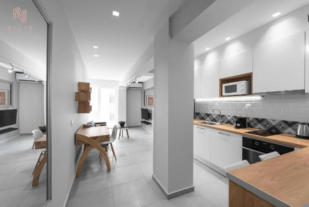 Kitchen or kitchenette in Big Apple, Nilie Hospitality MGMT