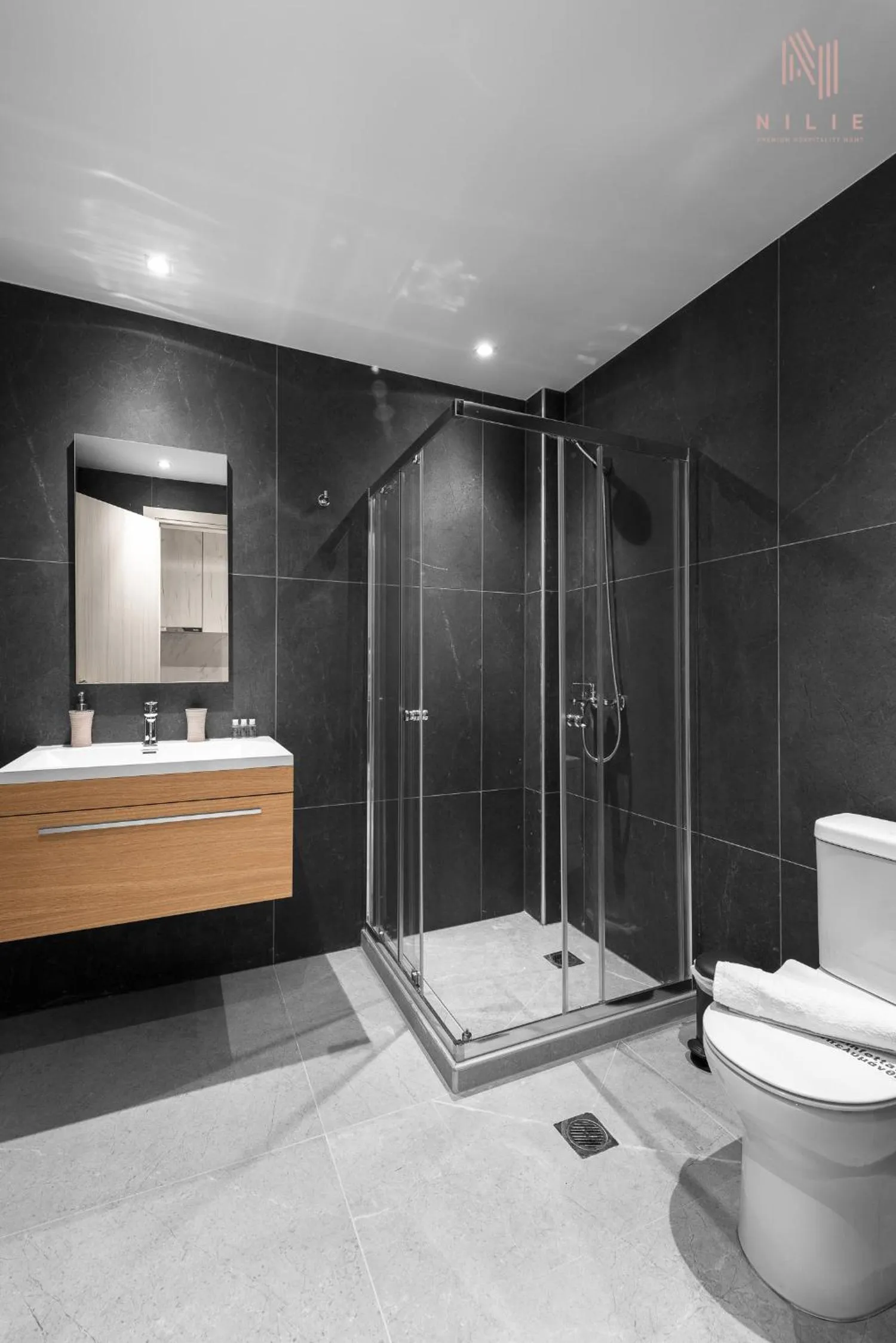 Shower in Big Apple, Nilie Hospitality MGMT