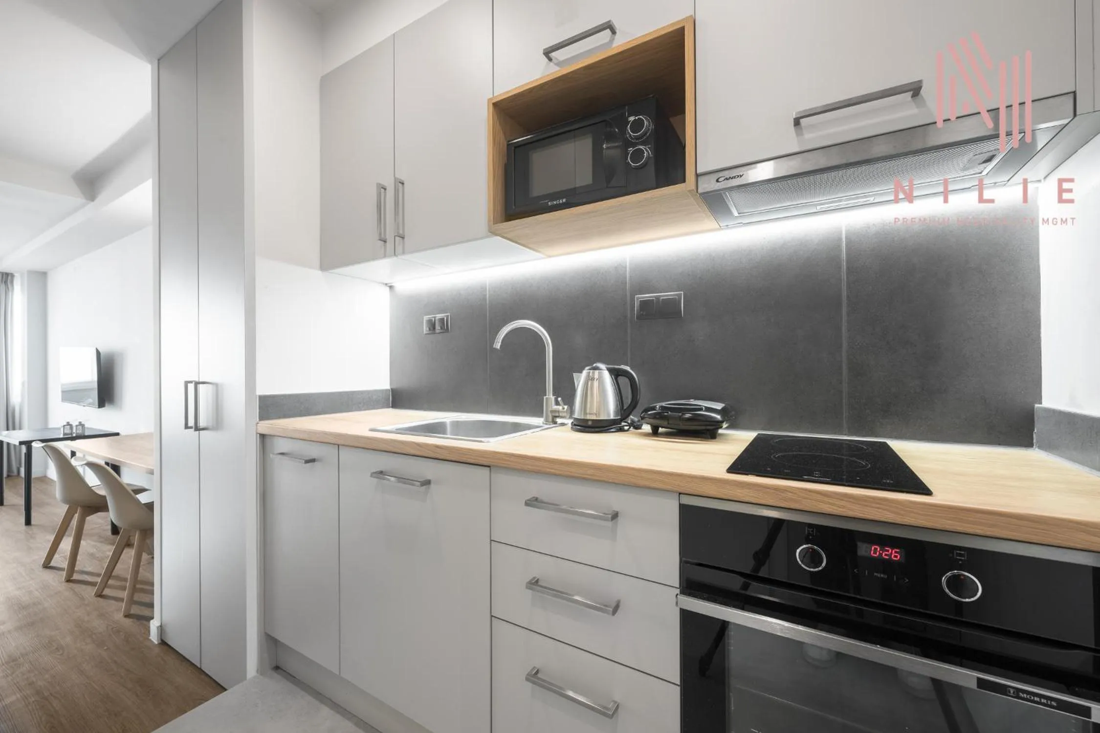 Kitchen or kitchenette in Big Apple, Nilie Hospitality MGMT