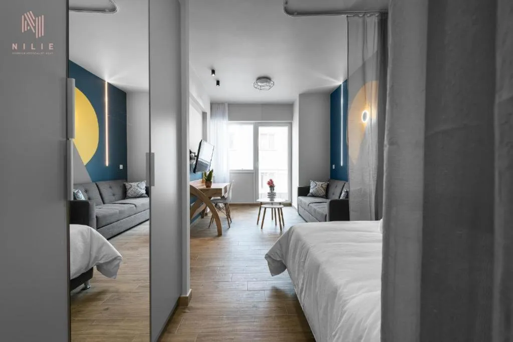 Living room, Bed in Big Apple, Nilie Hospitality MGMT