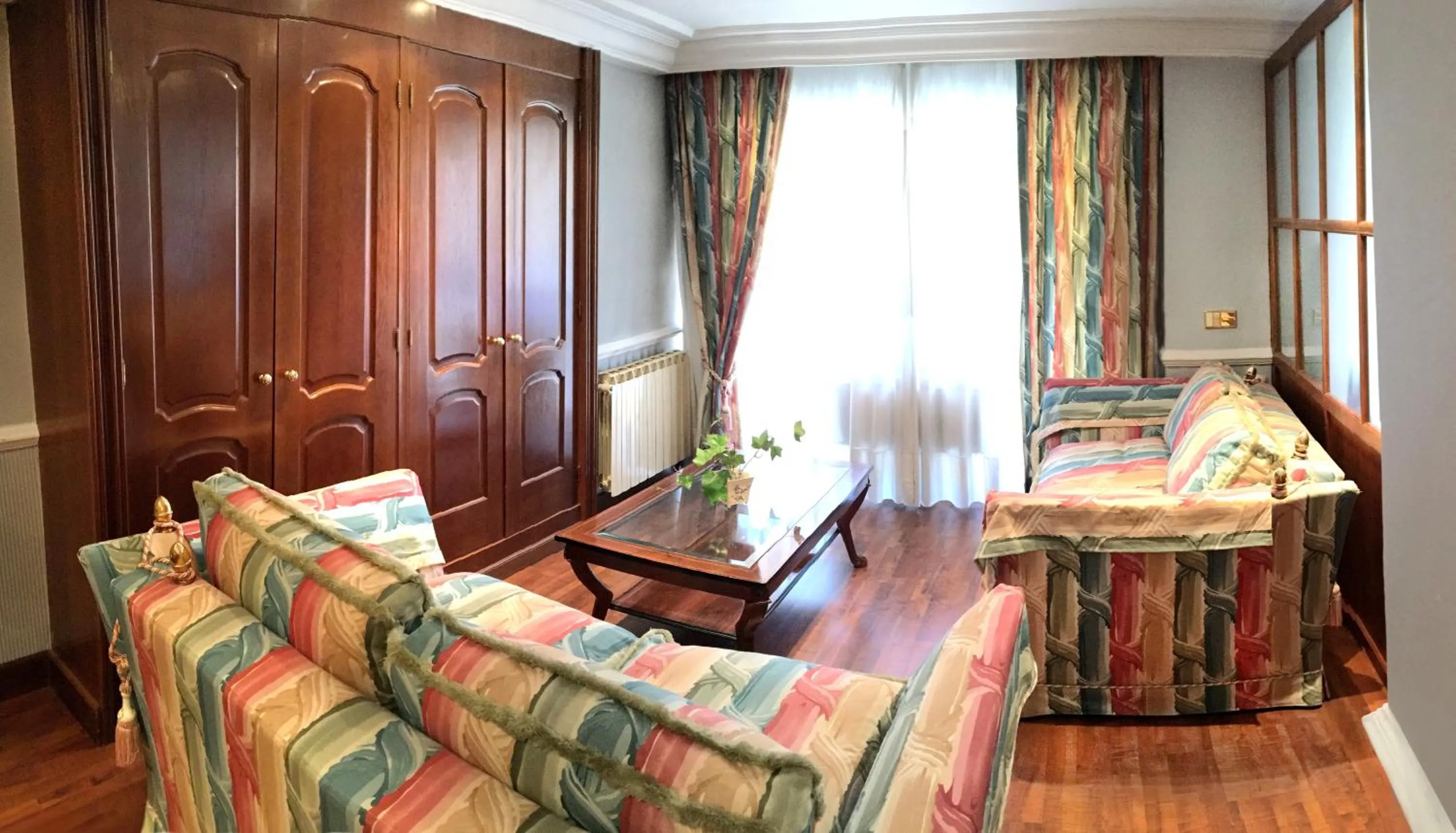 Living room, Bed in Hotel Maria Luisa